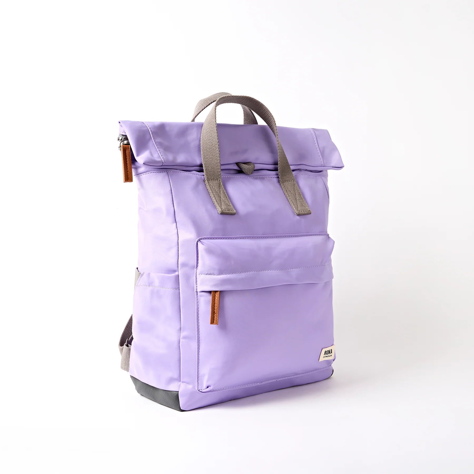Purple backpack with gray straps on a white background