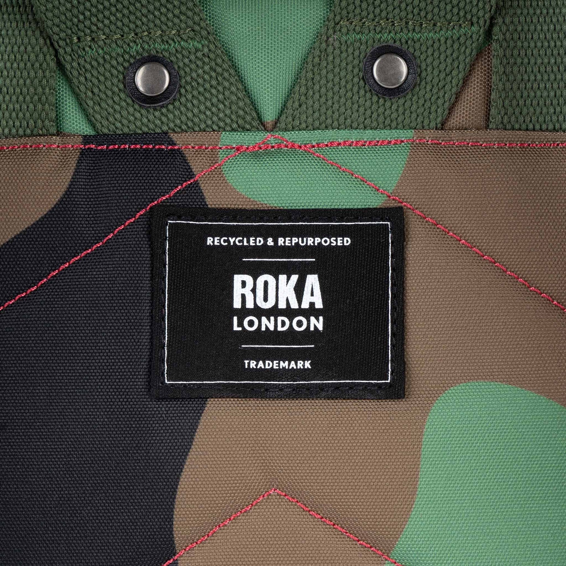 Roka London label on a camouflage-patterned product