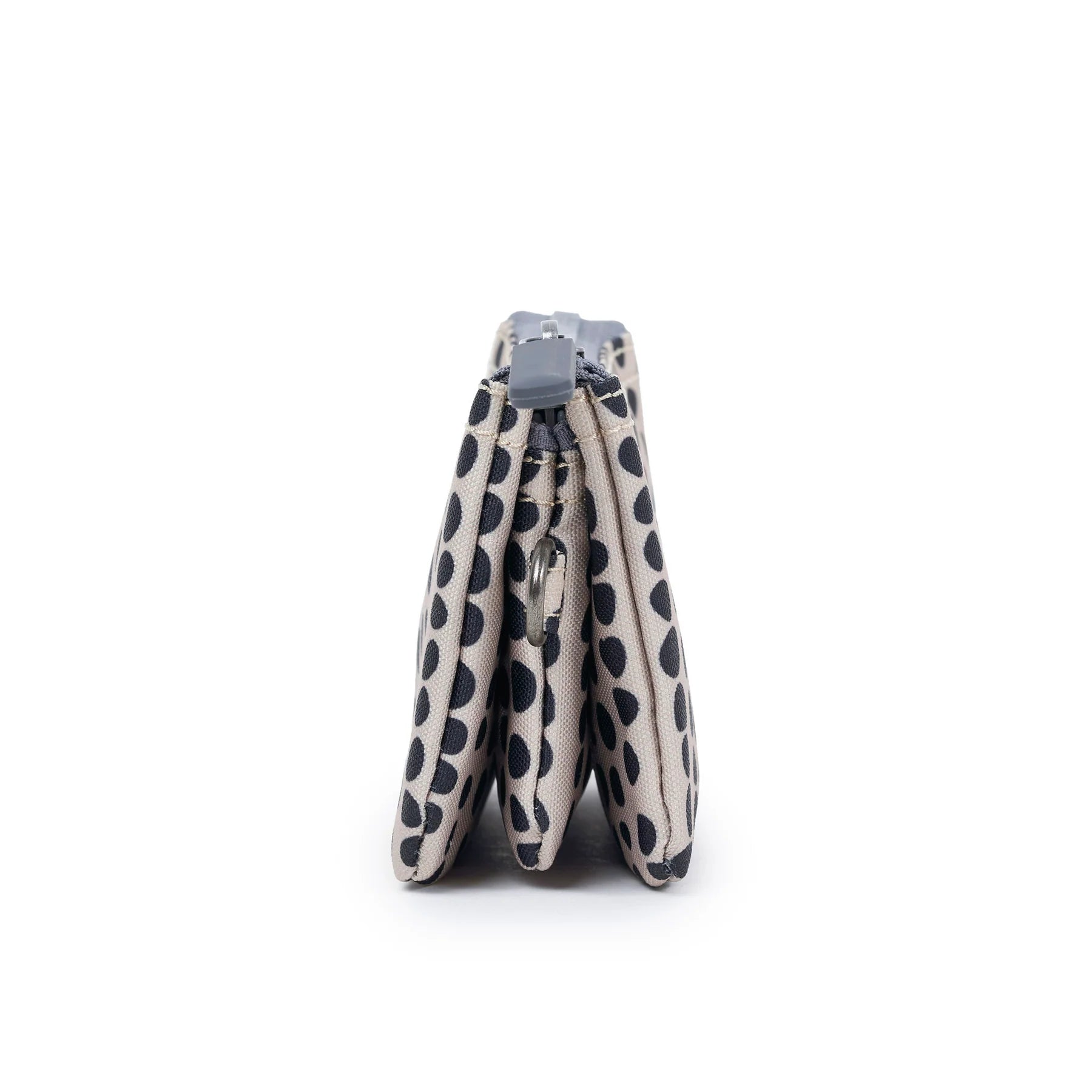 Dog collar with black spots on a white background