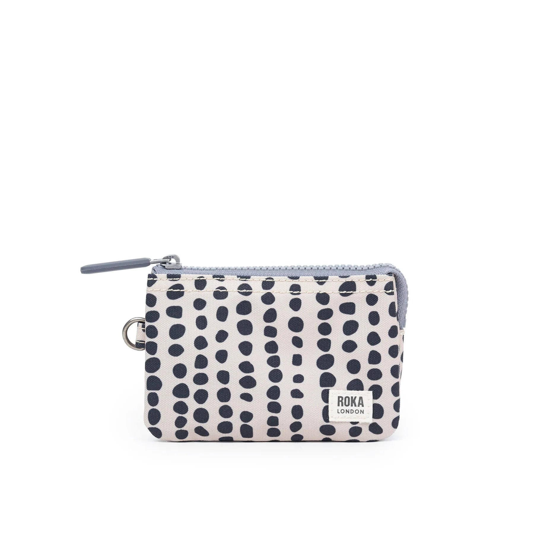Roka canvas purse with linear navy blue dots. 