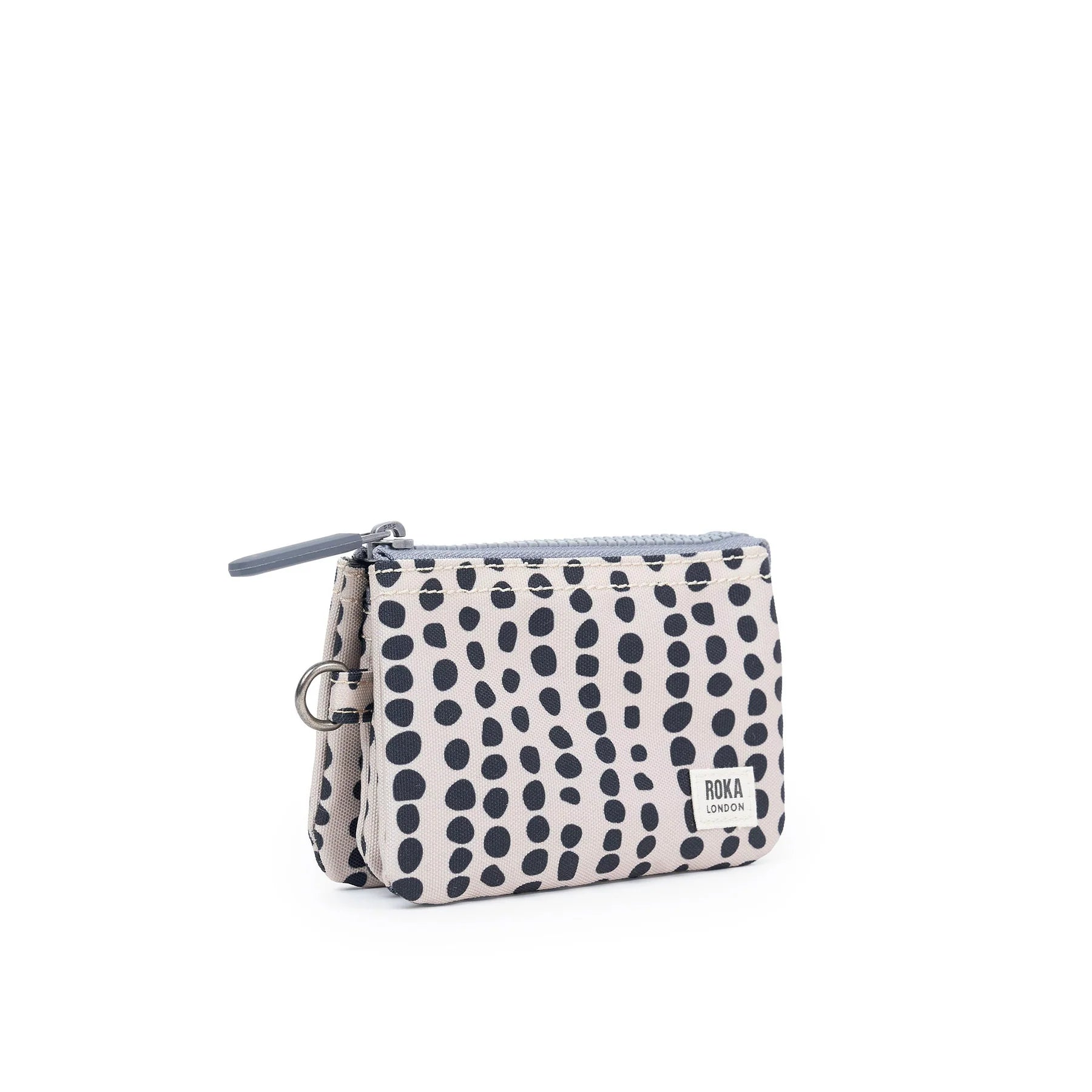 Roka canvas purse with linear navy blue dots. 