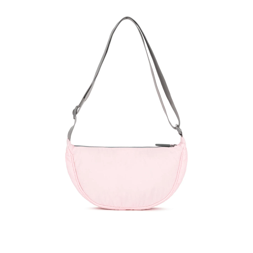 ROKA bag in soft pink with a gray strap, designed for stylish and practical everyday use.