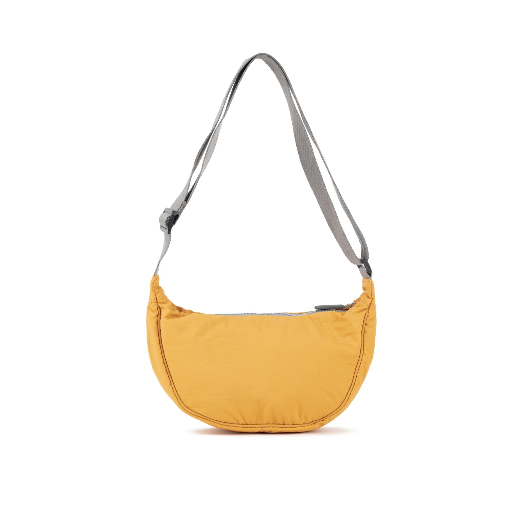 Mustard yellow crescent-shaped crossbody bag with gray straps and zipper closure.