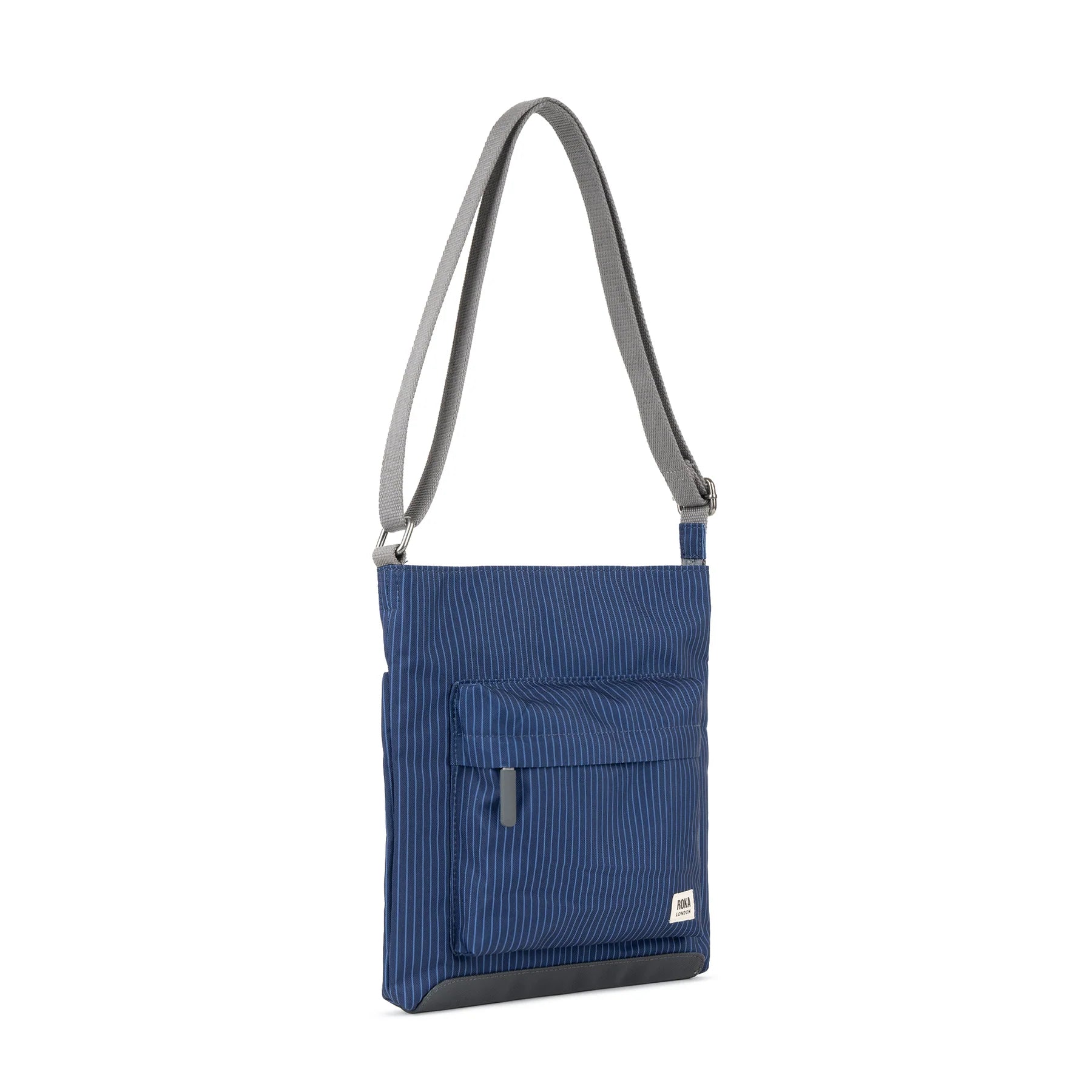 Navy blue striped crossbody bag with gray shoulder strap and small front pocket.
