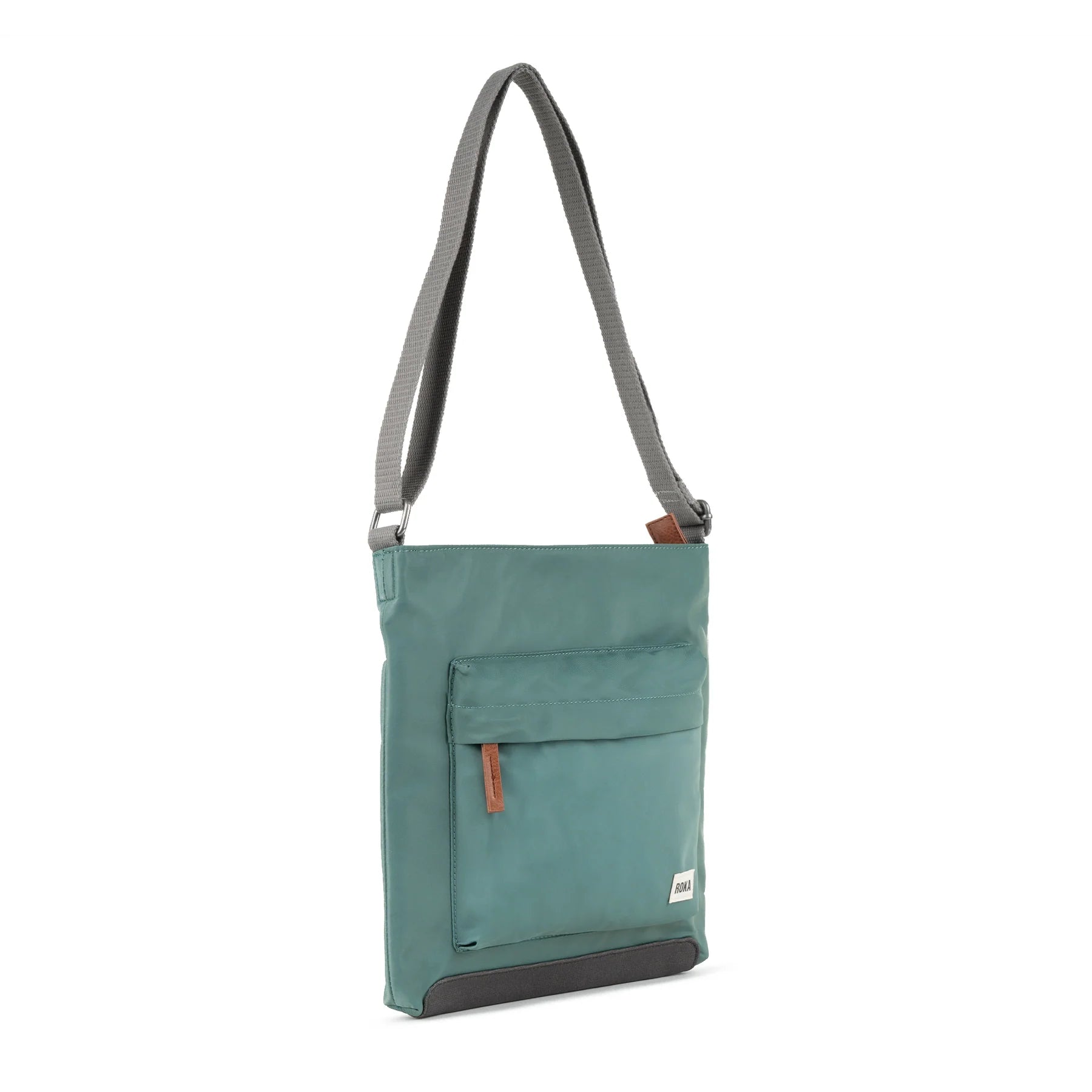 Teal crossbody bag with gray straps and a smaller front pocket. The bag has a gray bottom panel and a small brand label.