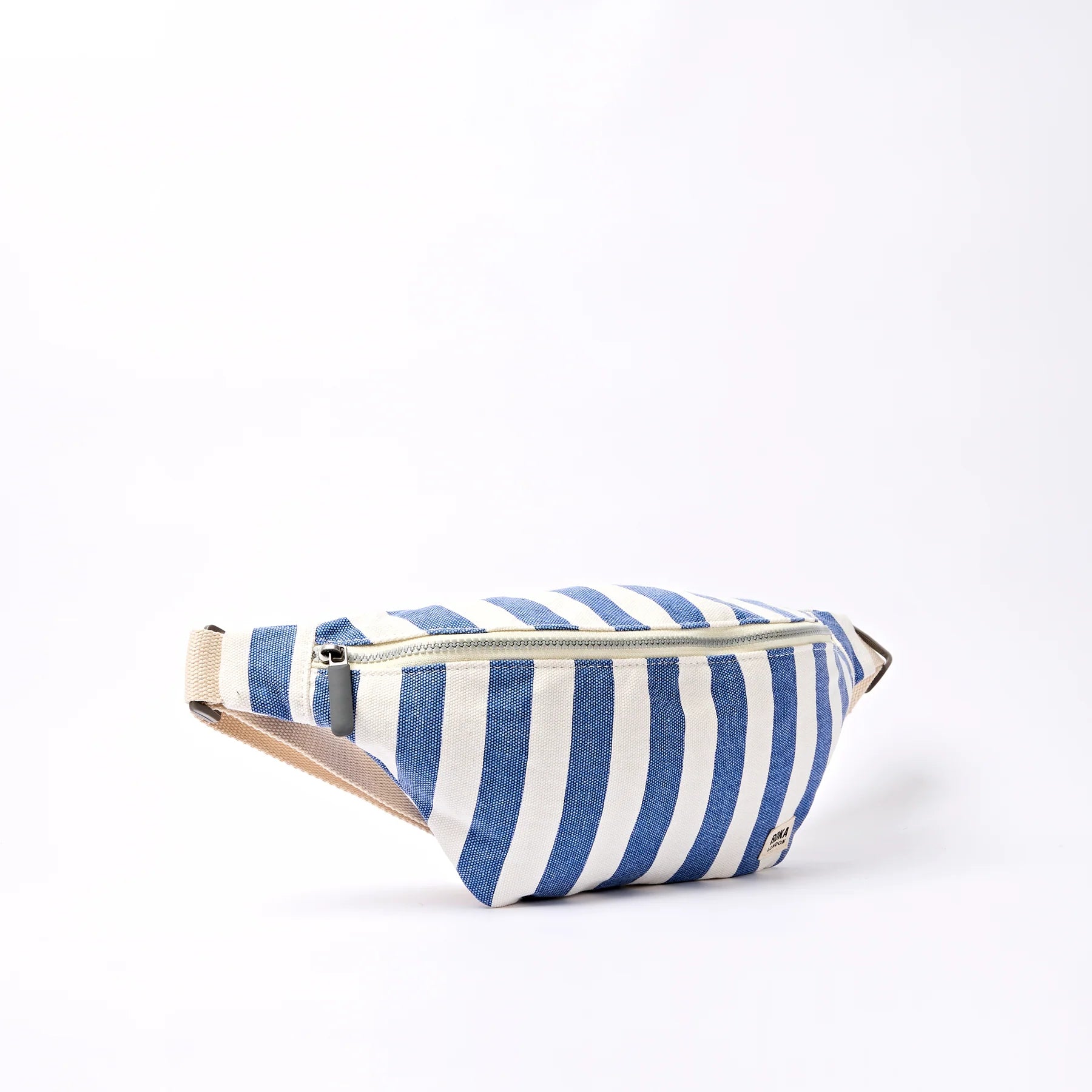 Blue and white striped fanny pack on a white background