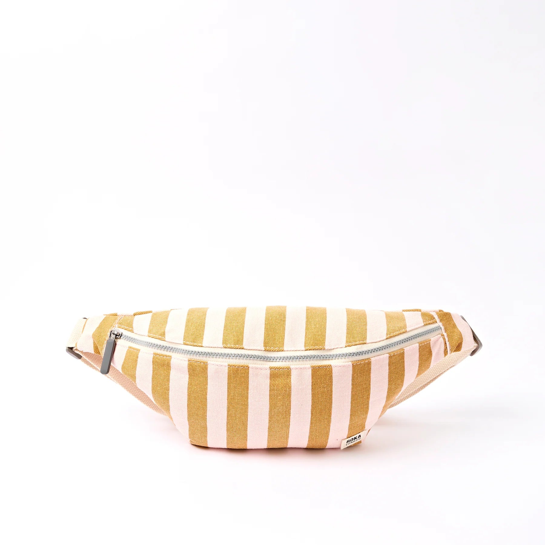 Striped fanny pack with yellow and white stripes on a white background