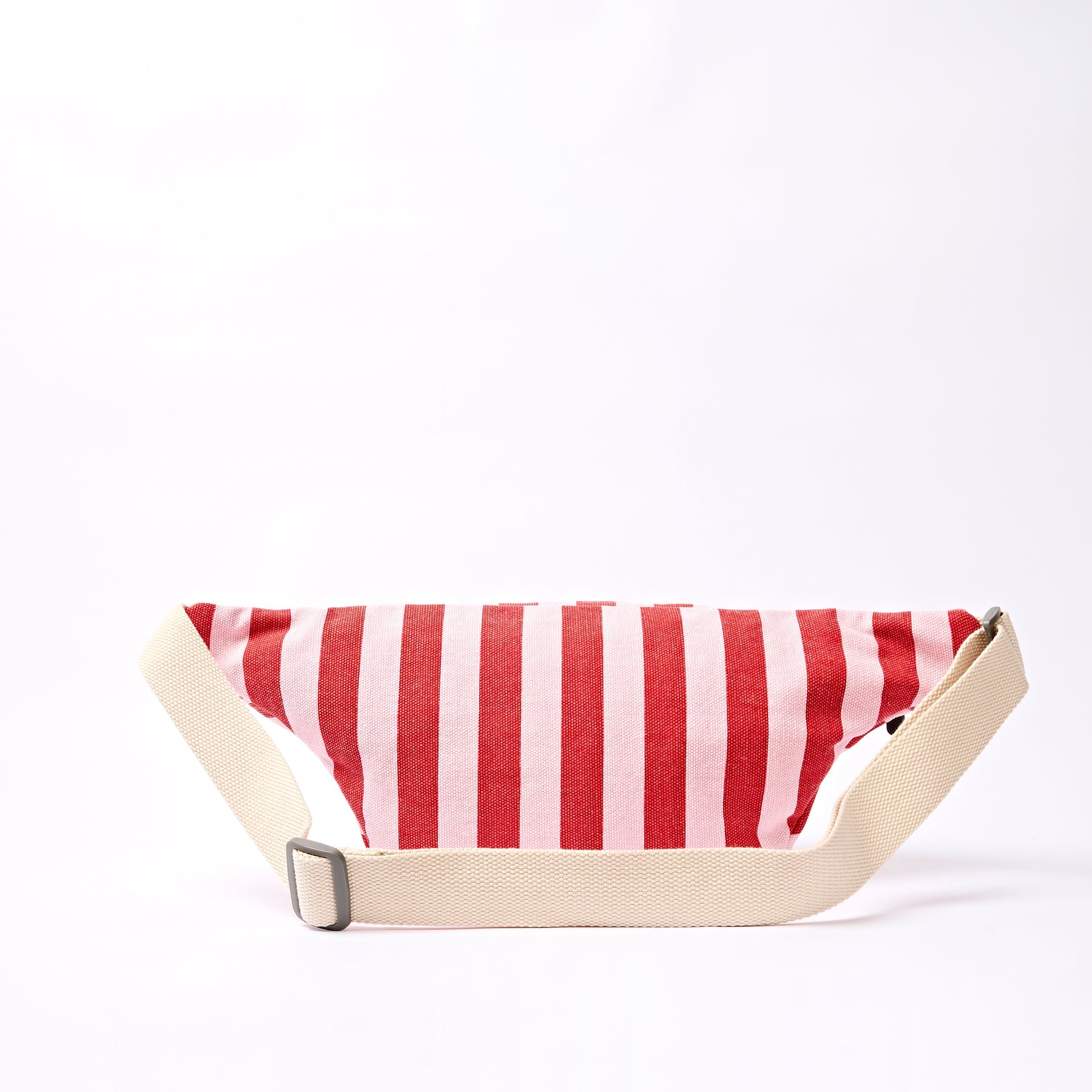 Red and white striped dog bed on a white background