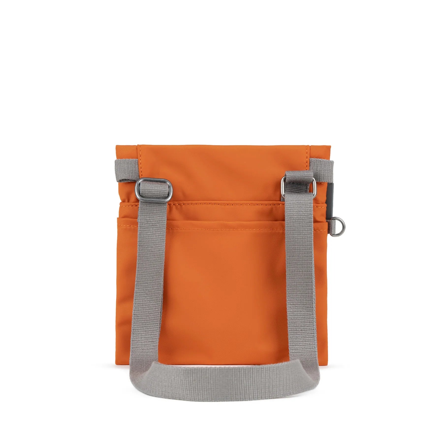ROKA orange bag with gray straps, featuring a sleek design and practical storage solutions.