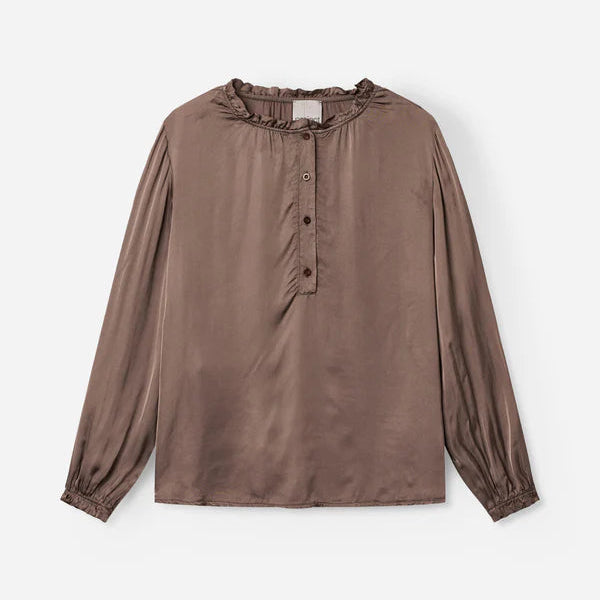 Brown blouse with long sleeves on a white background