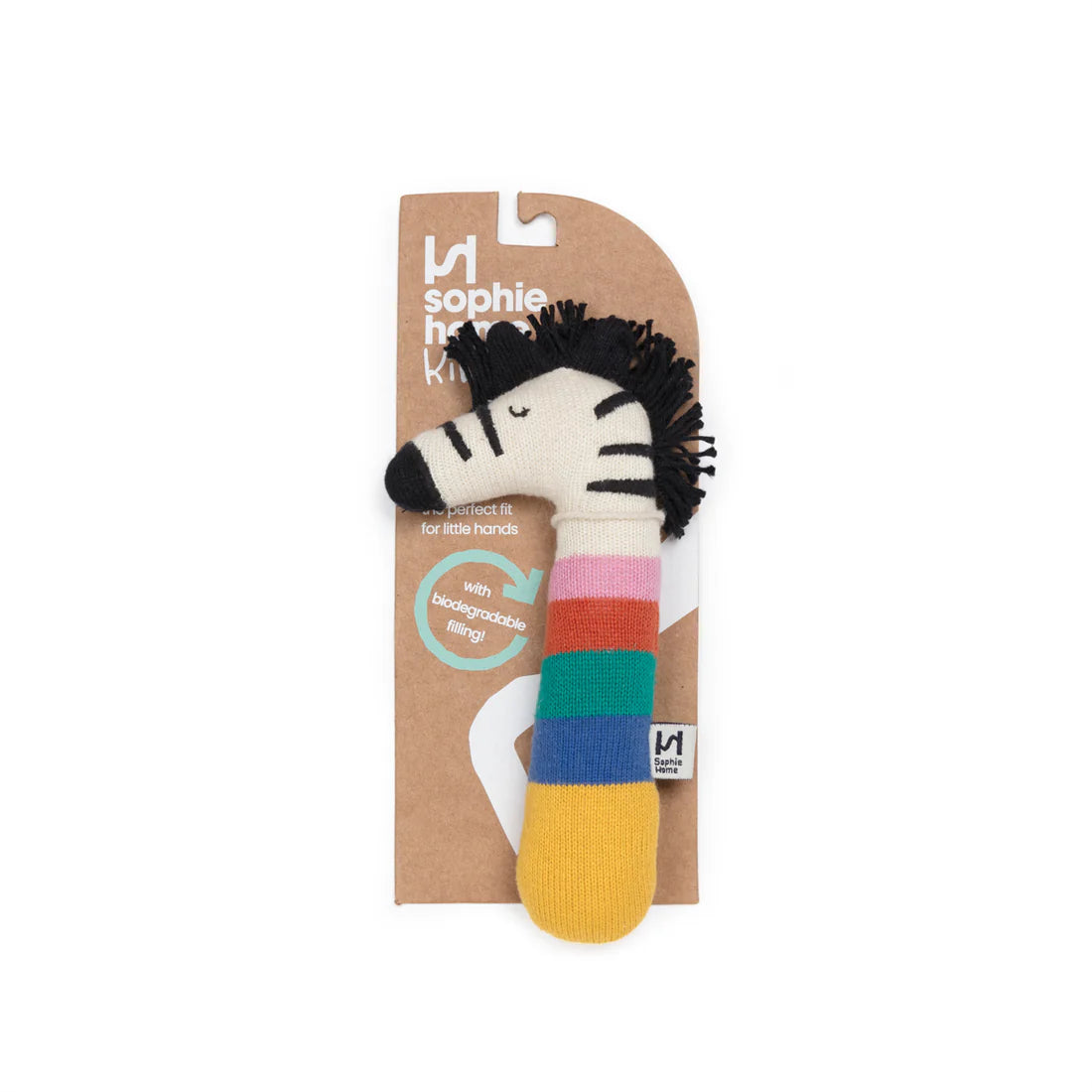 Zebra-themed toy with colorful stripes on a white background