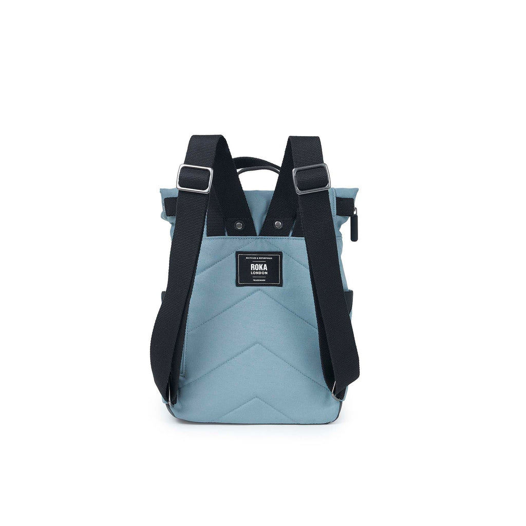 Light blue ROKA backpack with black straps and a chevron design, perfect for everyday use.