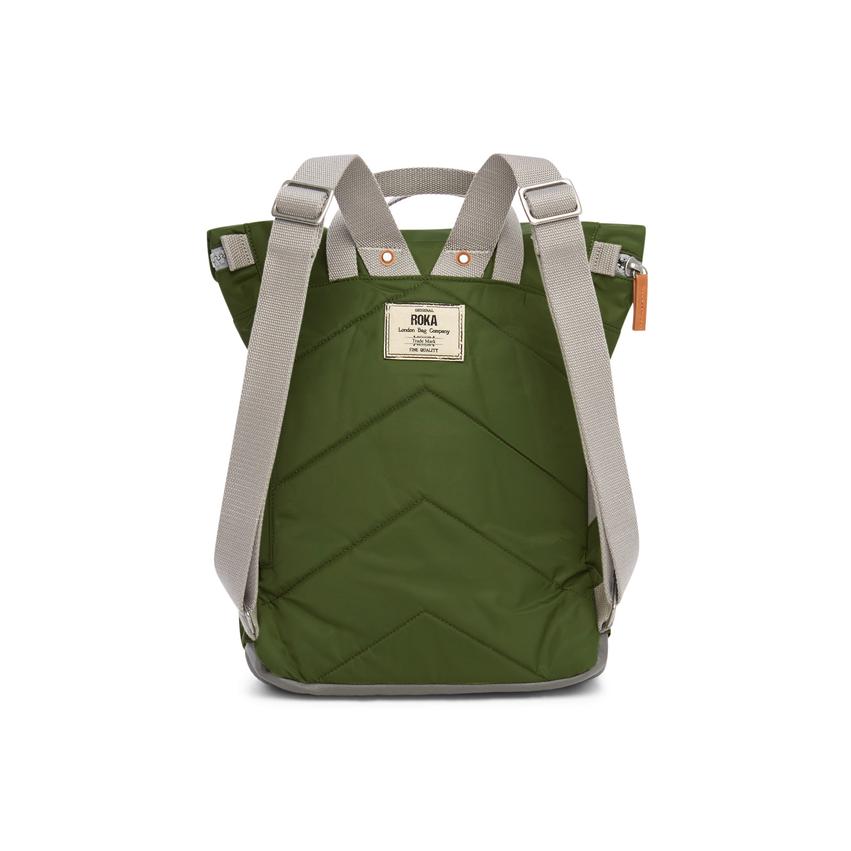 Olive green quilted backpack with light gray straps and a small brand label.