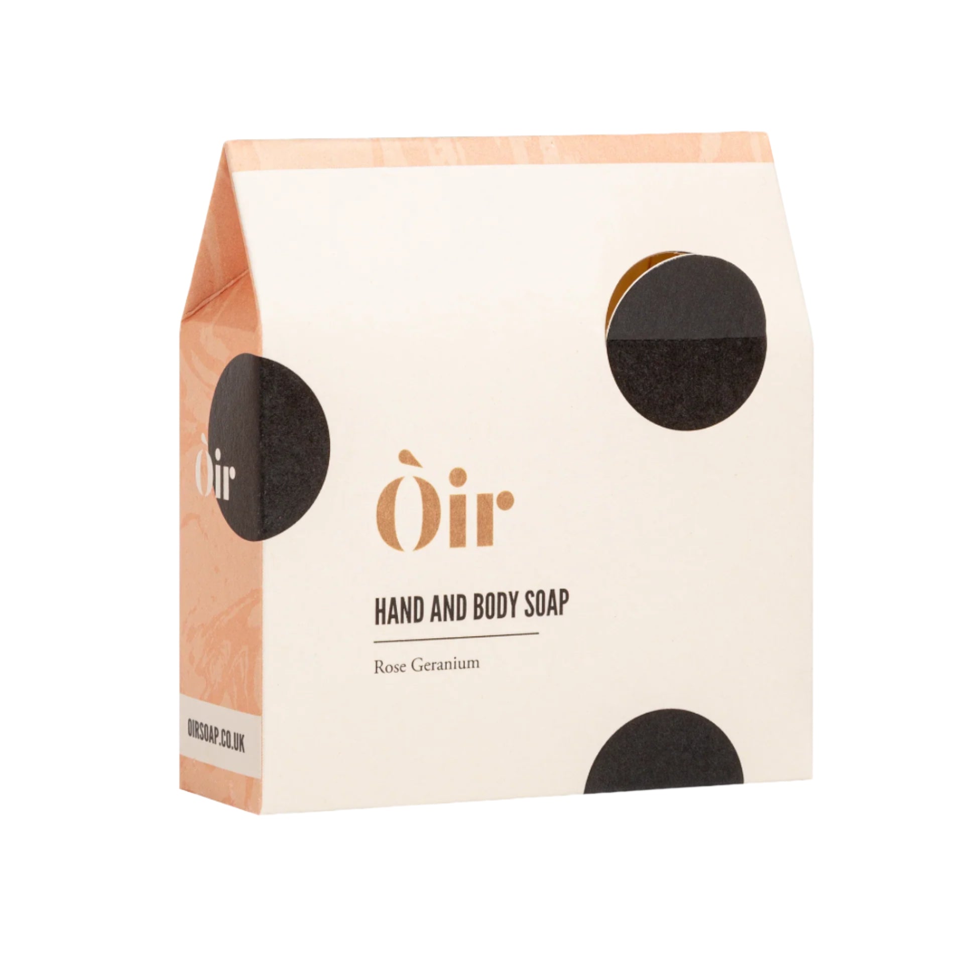 Bar soap with packaging that reads 'Oir Hand & Body Soap' Rose Geranium Scent. The packaging has a minimalist design with black dots and a hint of color on the lower right corner.