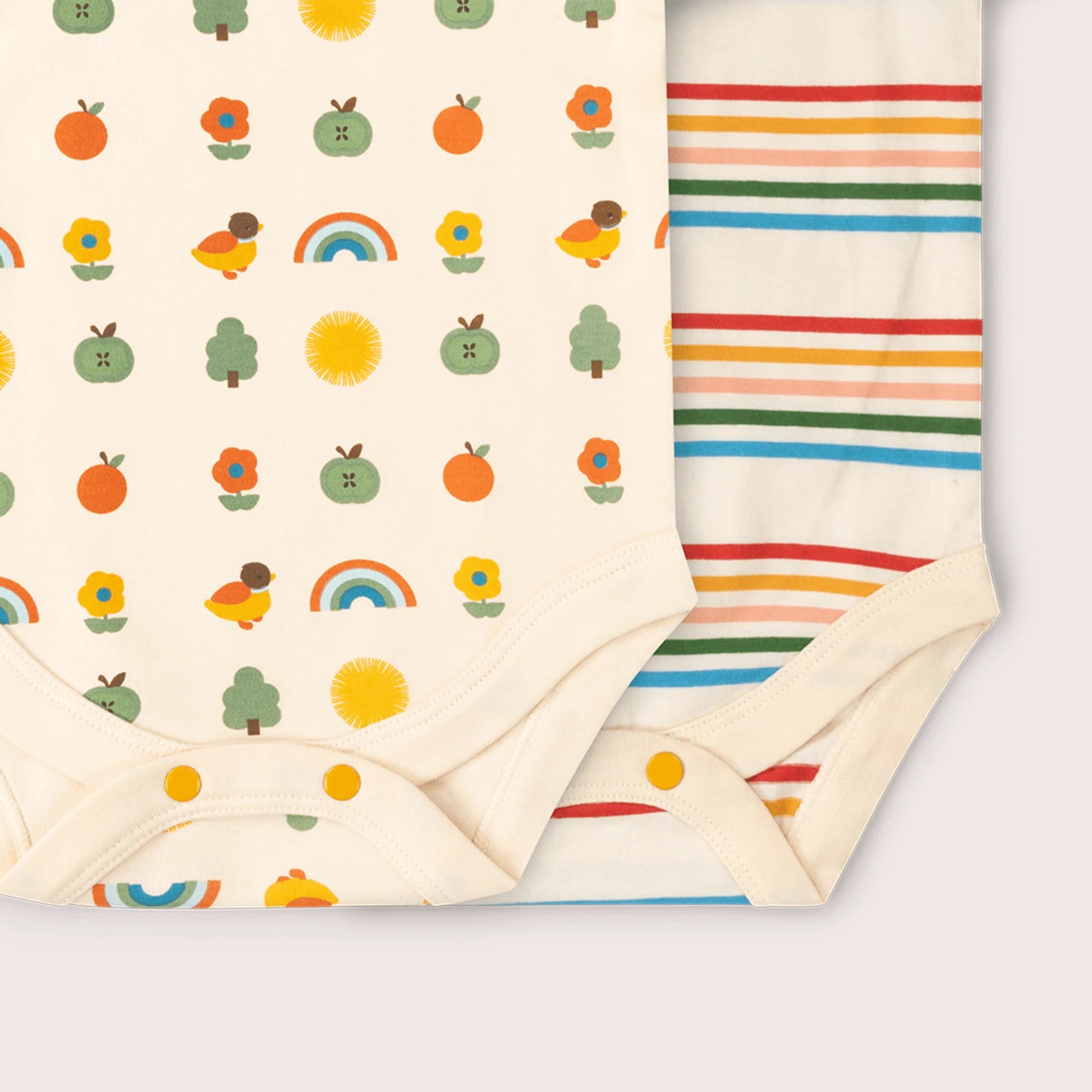 Two fabric swatches with colorful patterns on a white background