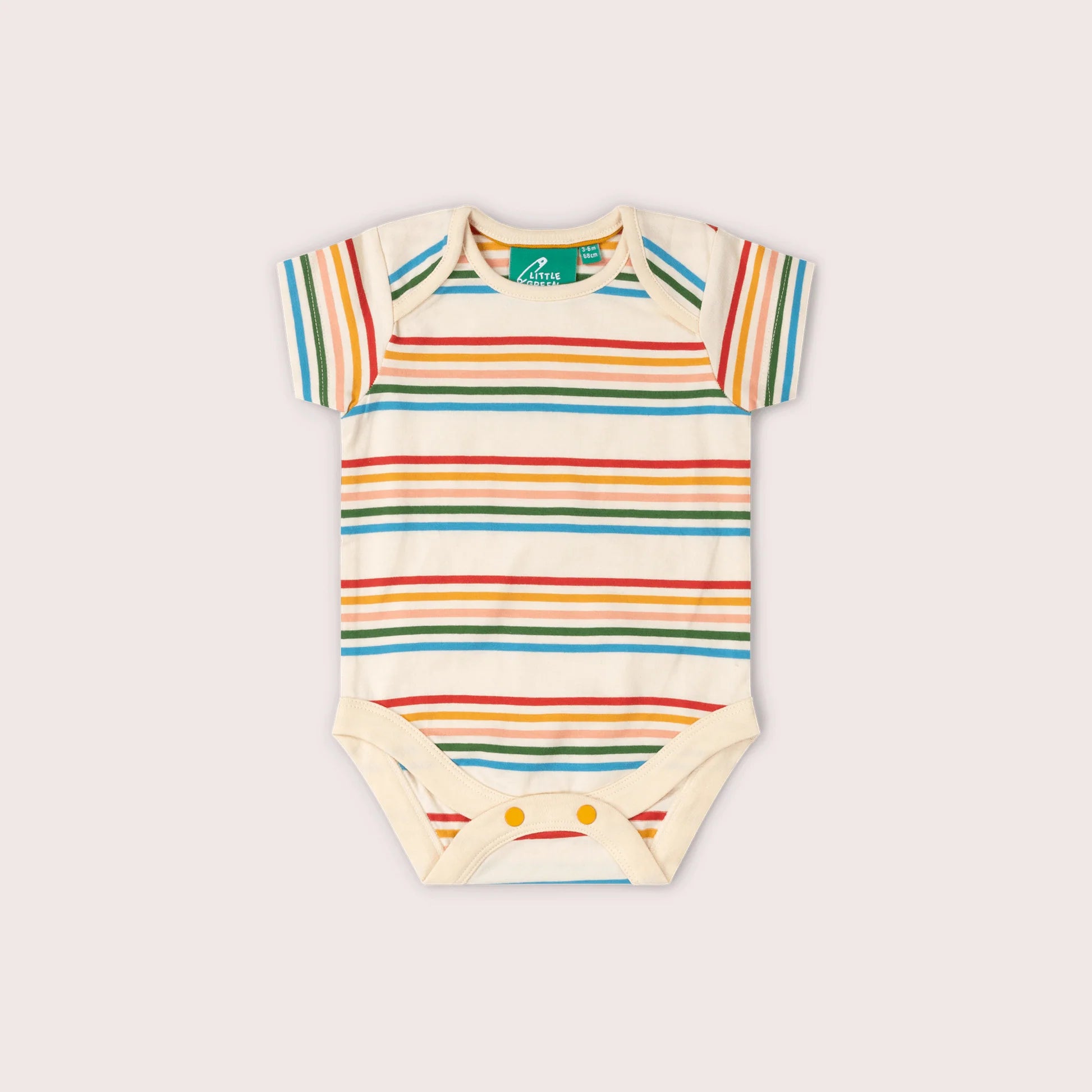 Baby onesie with colorful stripes on a light gray background