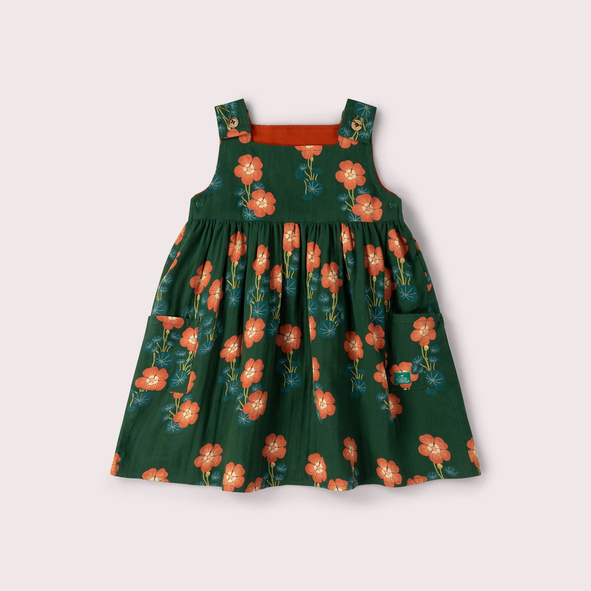 Green dress with floral pattern on a white background