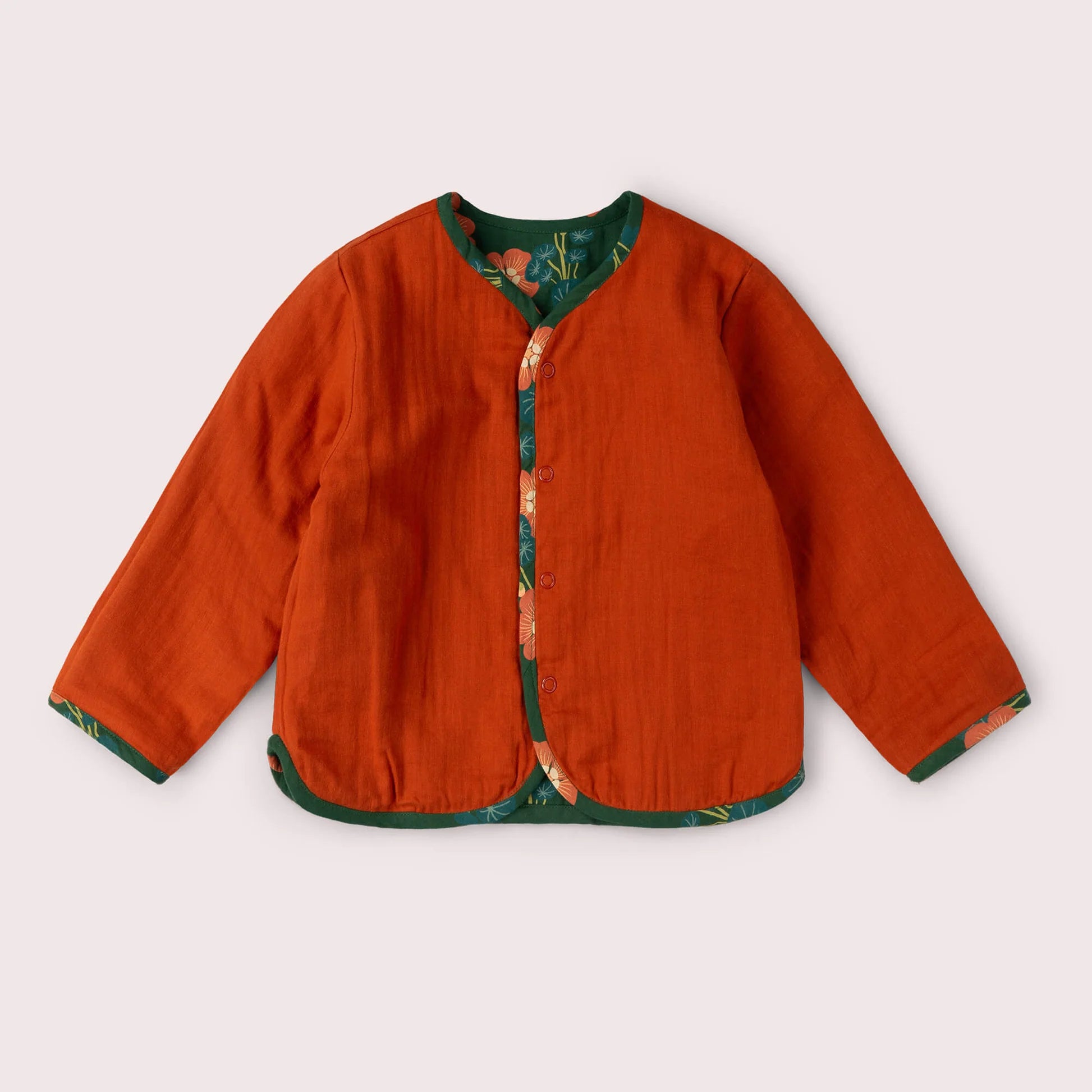 Orange jacket with floral lining on a white background