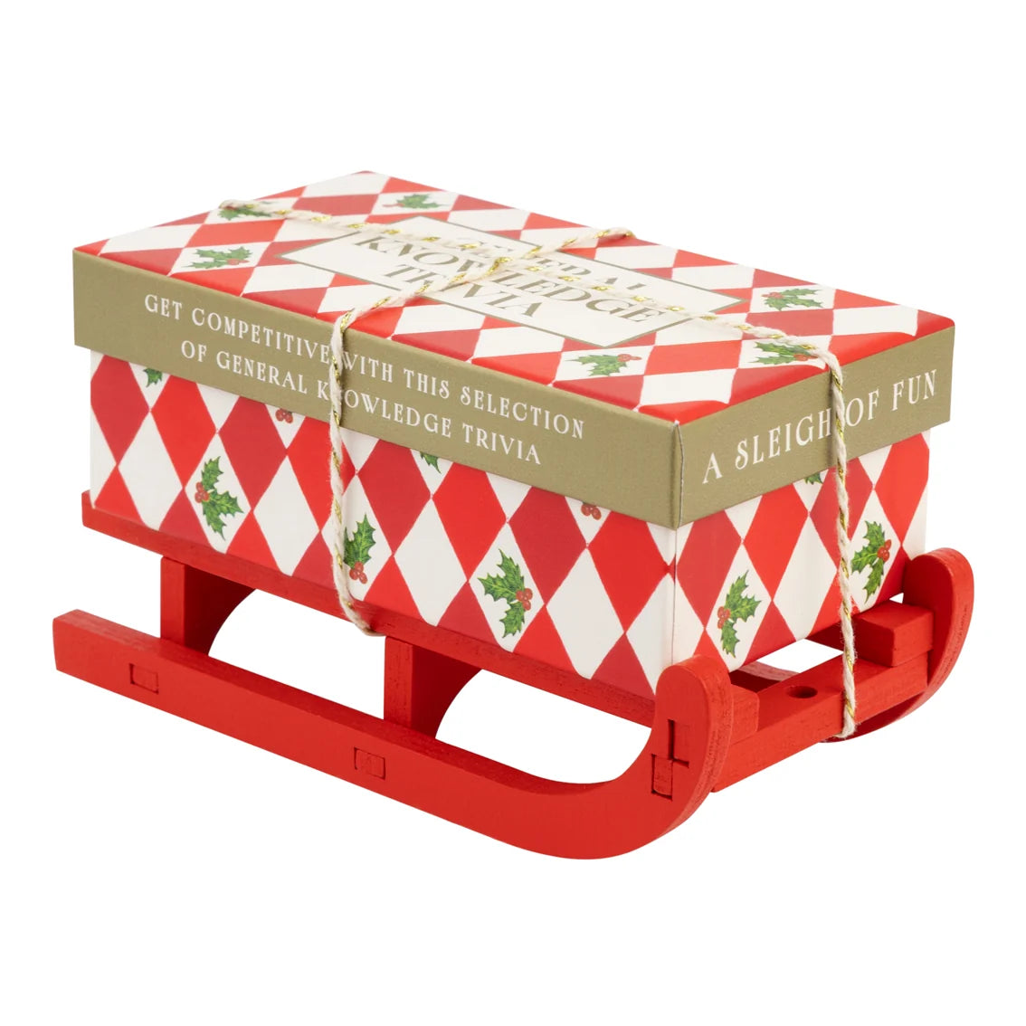 Red sleigh with a wrapped gift on top against a white background