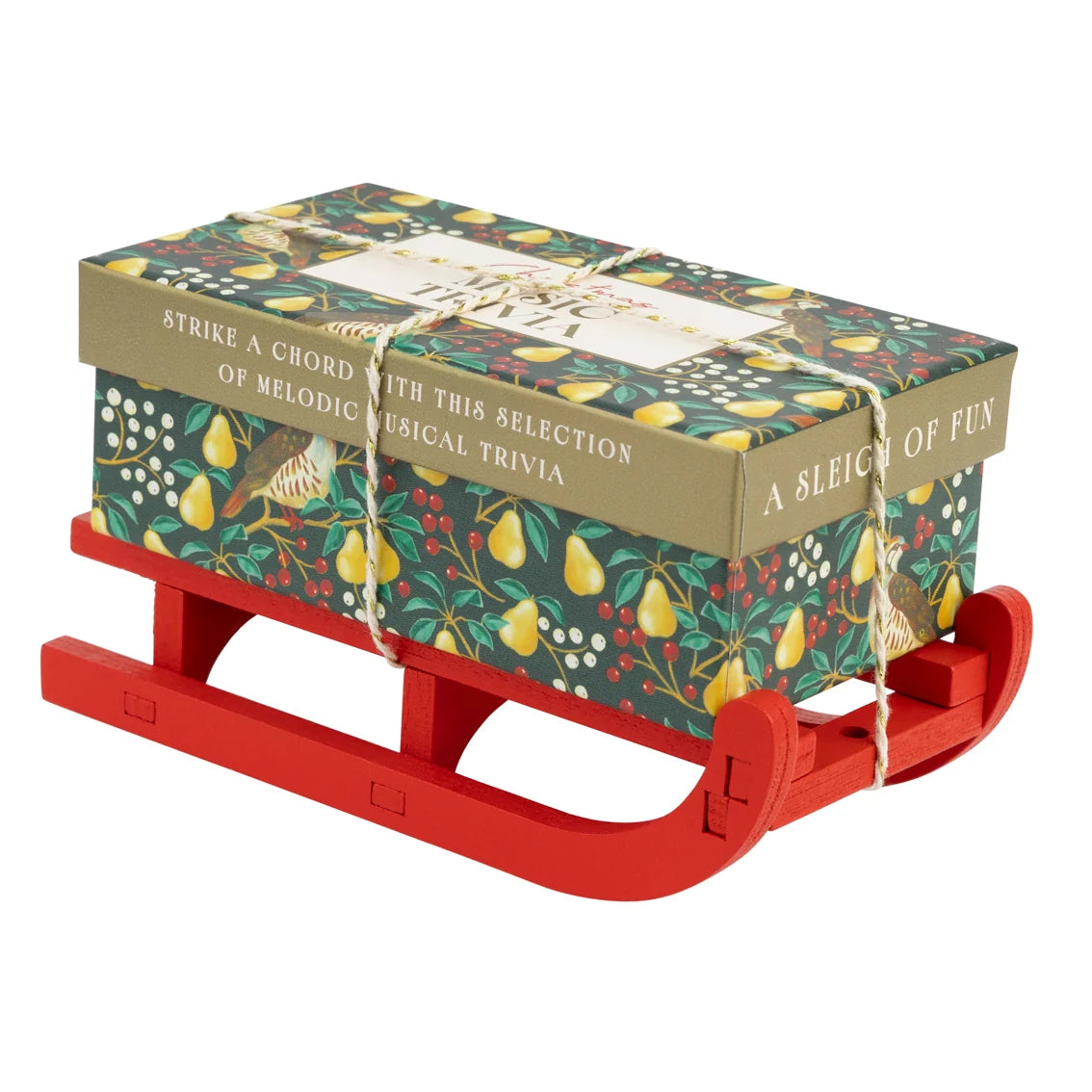 Red sleigh with patterned box on top on a white background