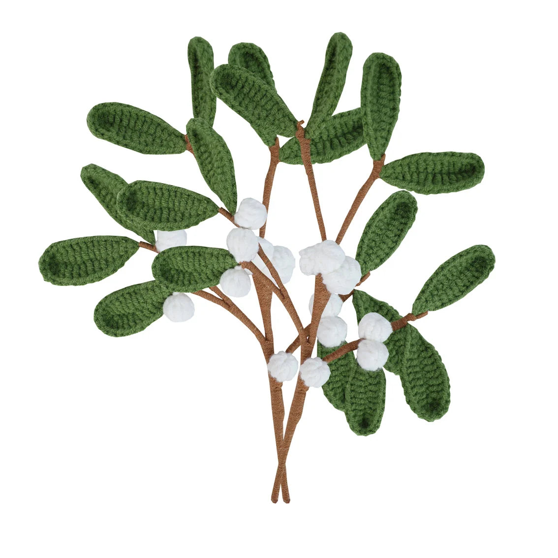 Crocheted mistletoe branch with green leaves and white berries on a white background