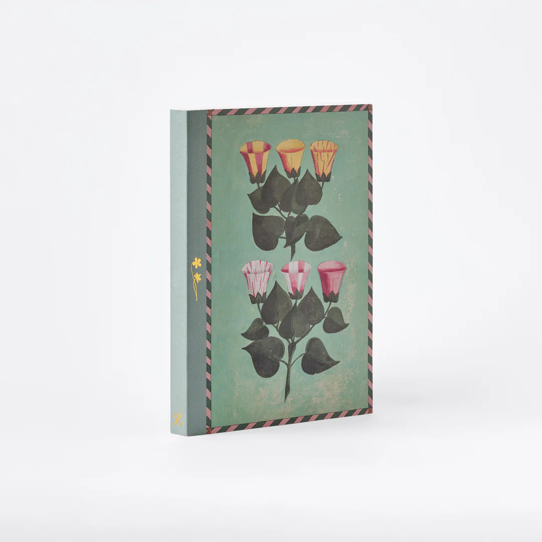 Notebook with floral design on a white background