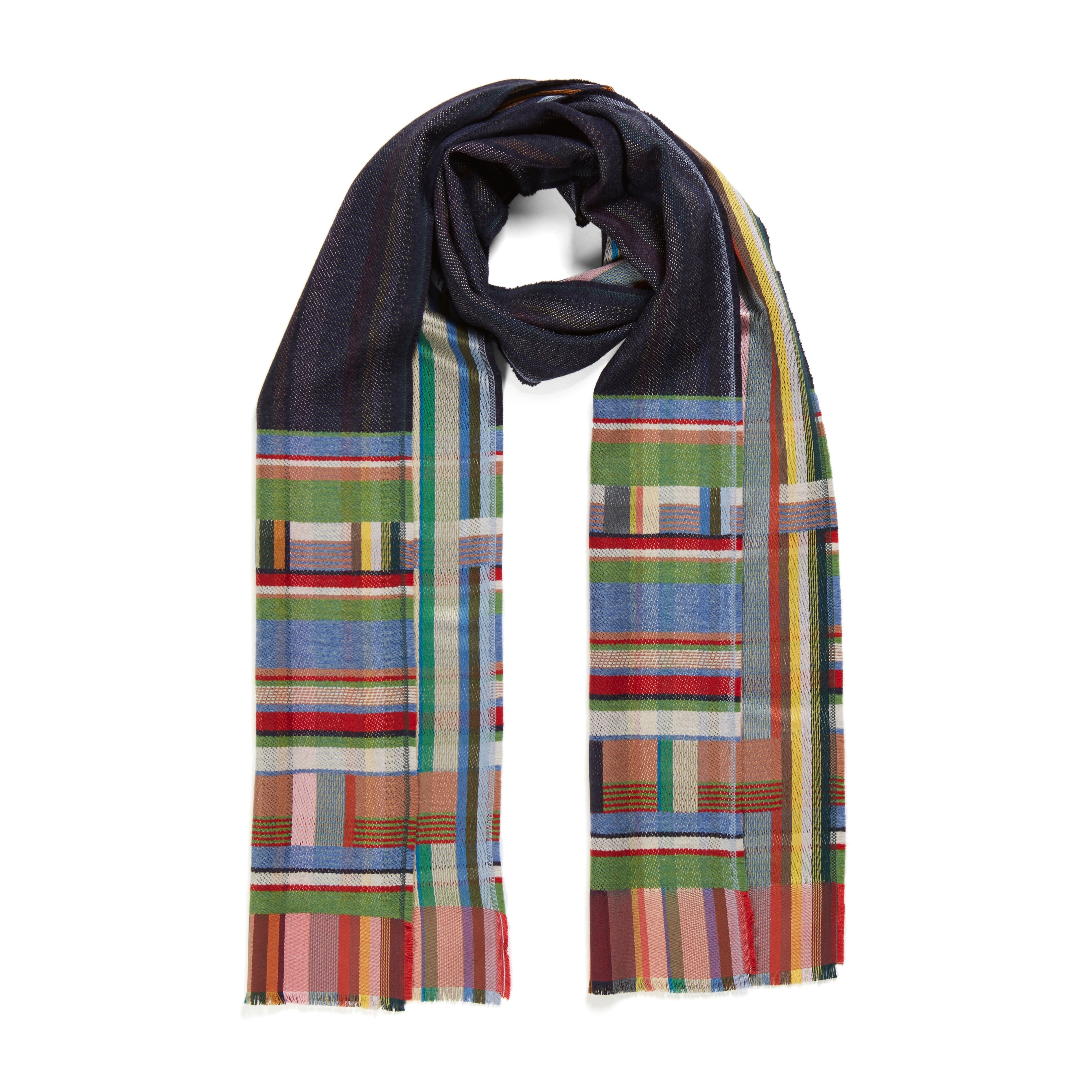 Multicolored woven scarf with a predominantly navy blue background and horizontal stripes of red, green, blue, and beige.