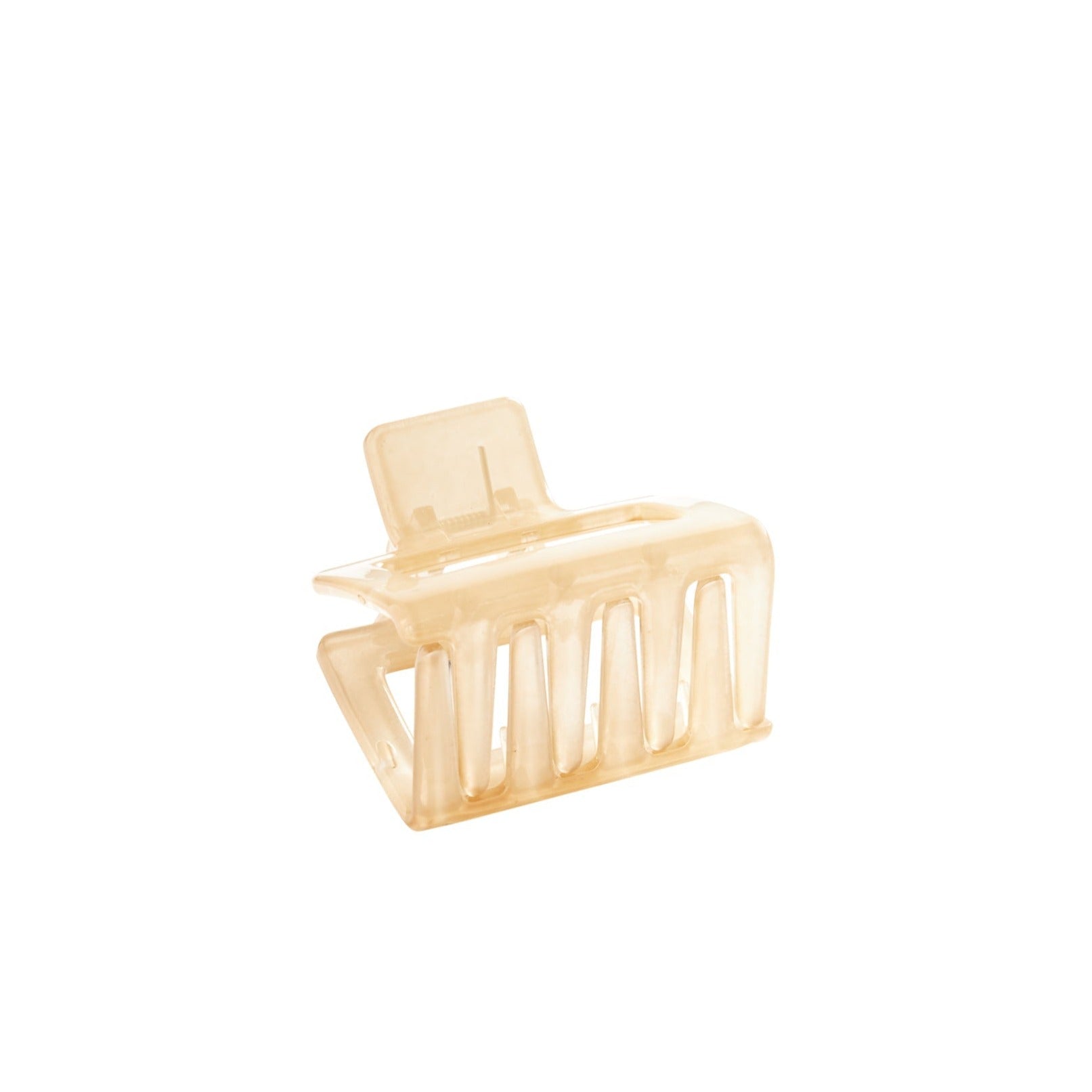 Beige plastic hair claw clip with a rectangular body and five vertical teeth.