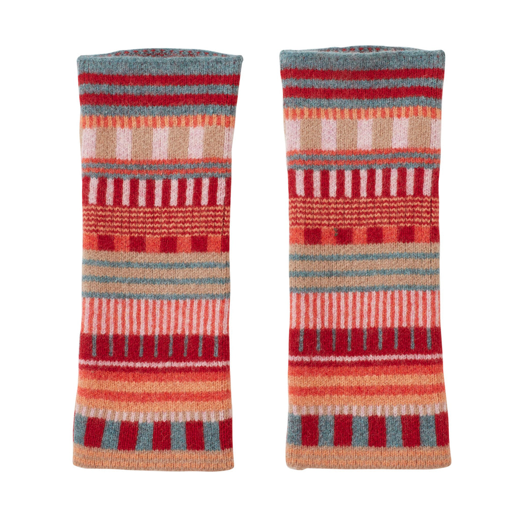Striped arm warmers in red, orange, blue, and cream by Donna Wilson. Cozy and vibrant pattern.