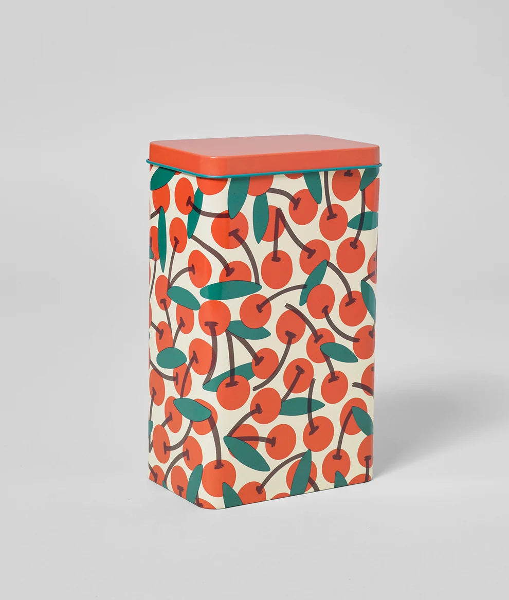 Rectangular tin container with cherry pattern on a white background