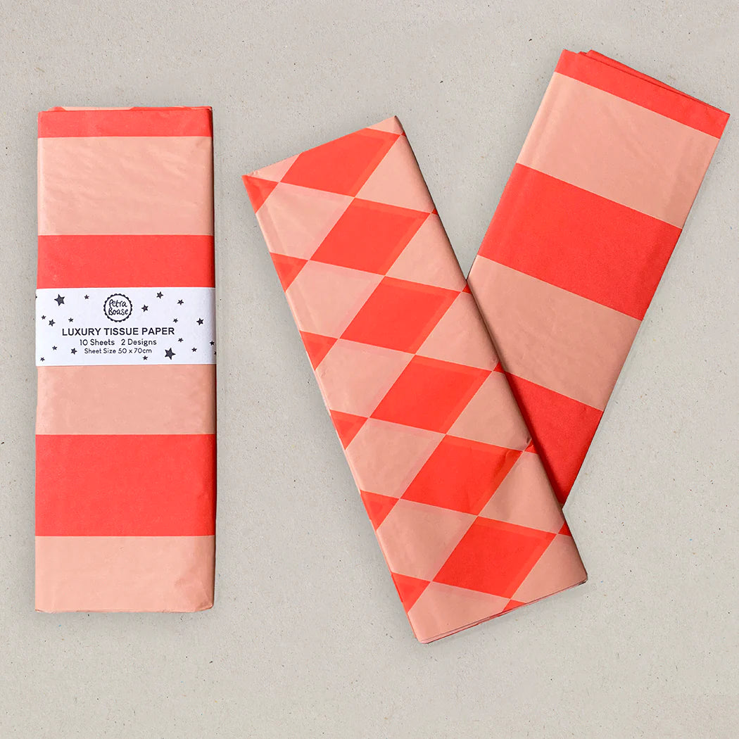 Ten sheets of luxury tissue paper in two coral and peach designs: horizontal stripes and a diamond pattern.