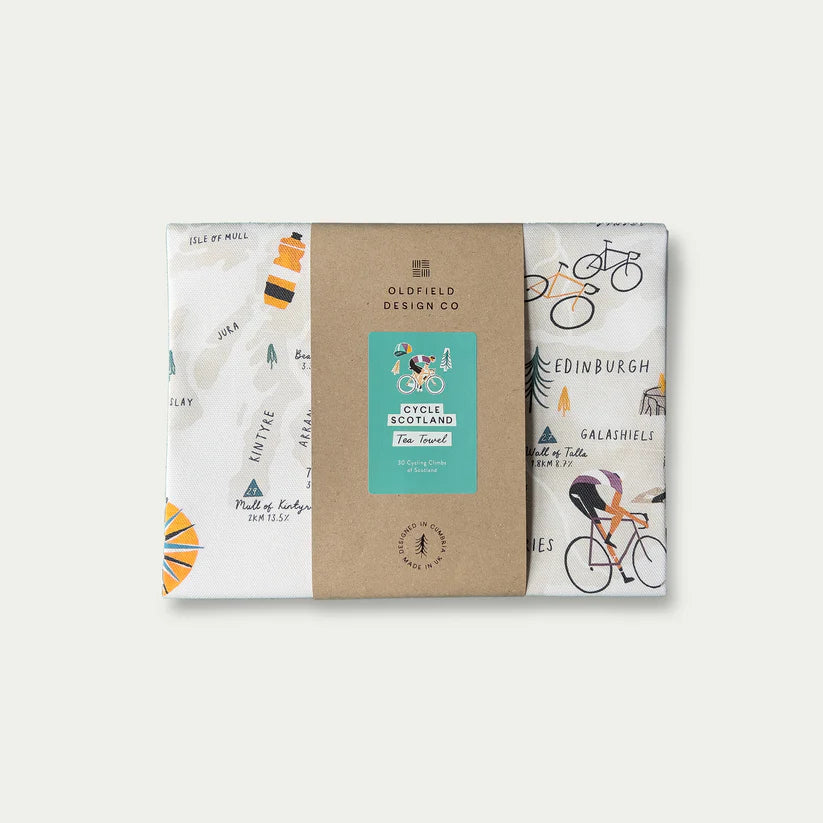 Cycle Scotland tea towel featuring a map of Scotland with cycling routes and illustrations of cyclists.