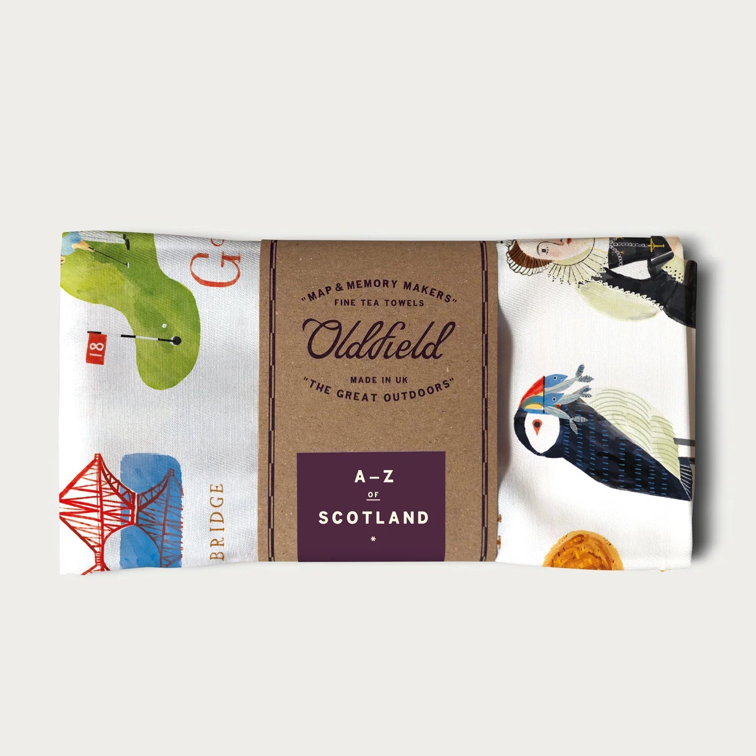 Tea towel with Scottish-themed graphics and text on a white background
