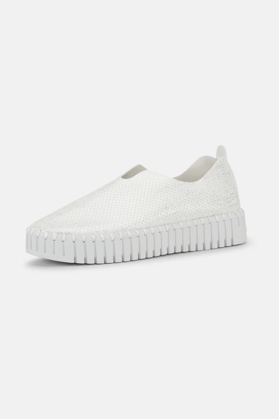 White slip-on sneaker with textured, sparkly upper and a ridged sole.