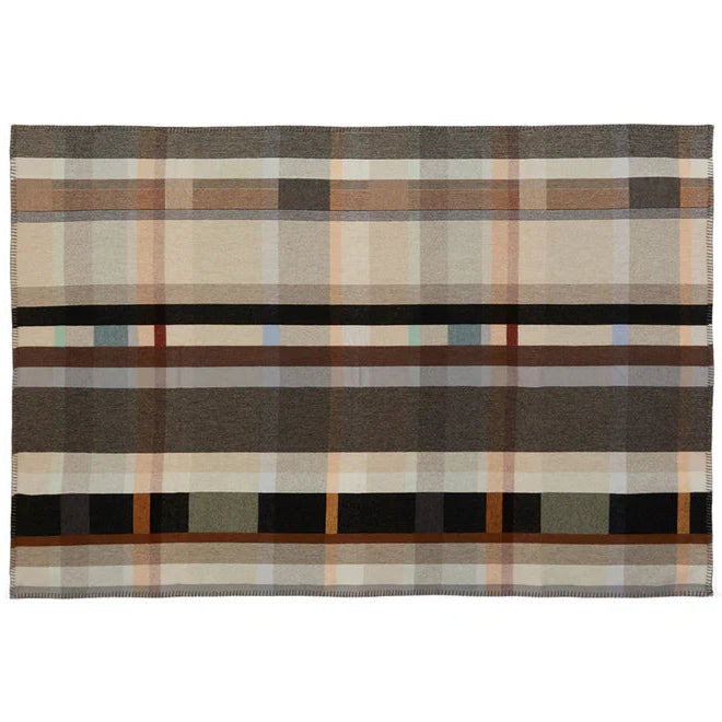 Plaid blanket with brown, beige, and black pattern on a white background