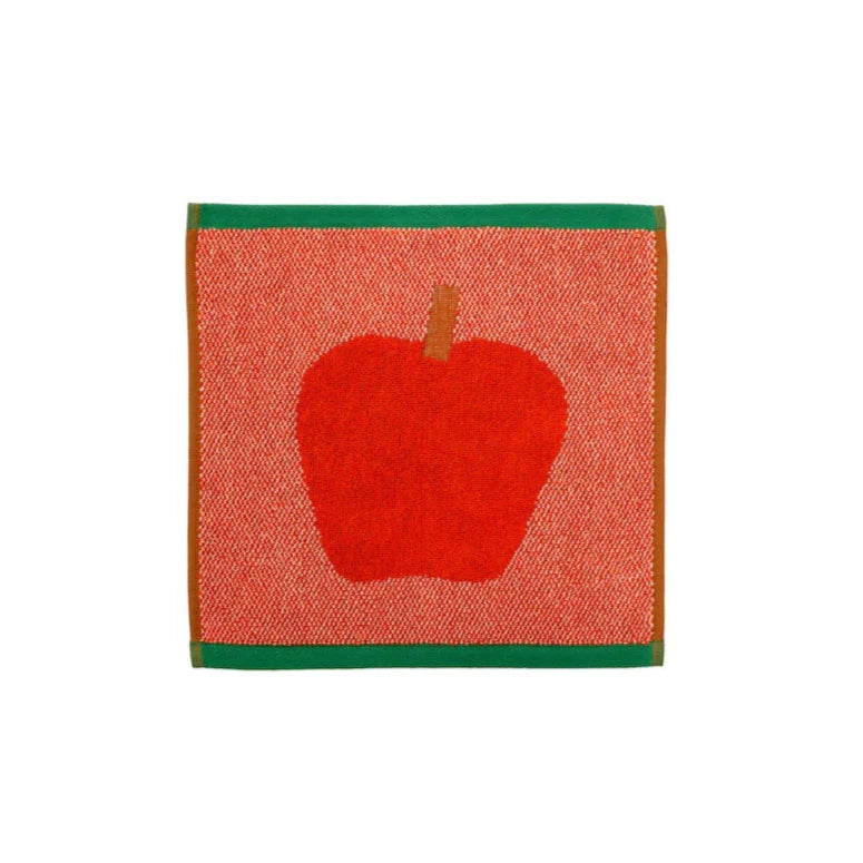 Fabric square with a red apple design on a white background