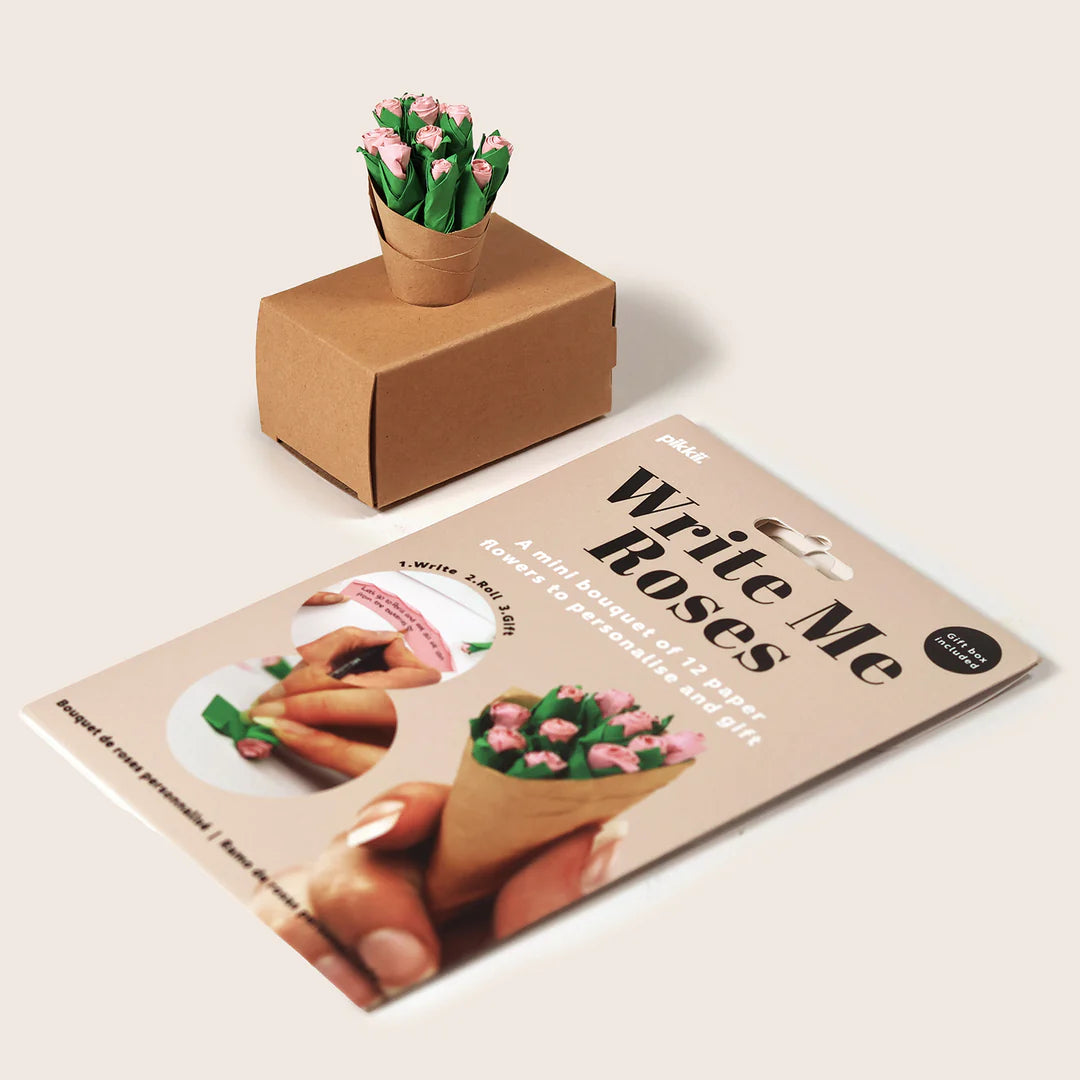 Product packaging with 'Write Me Roses' book and small potted plant on a beige background