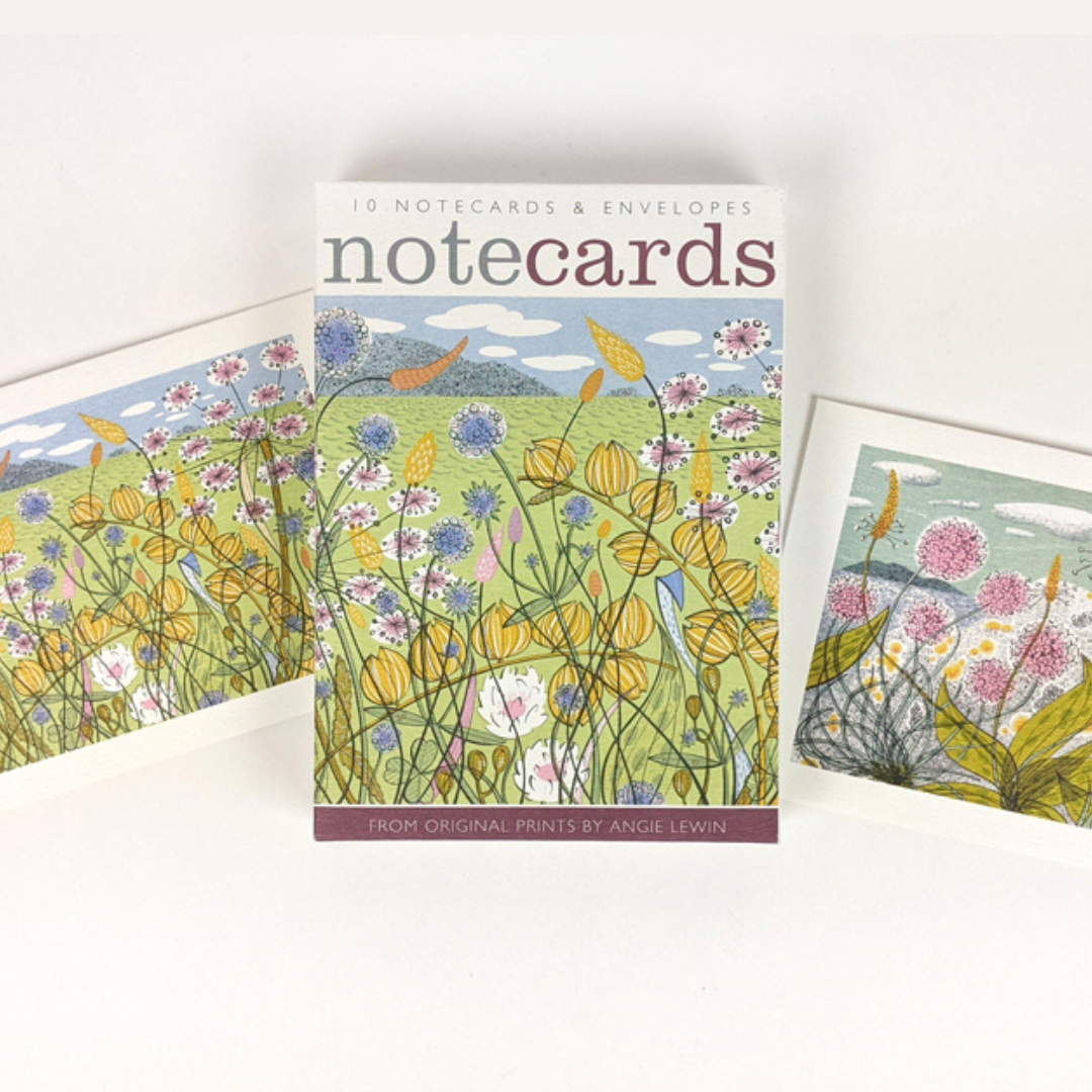 Set of 10 notecards and envelopes featuring a stylized floral meadow illustration in pastel colors.
