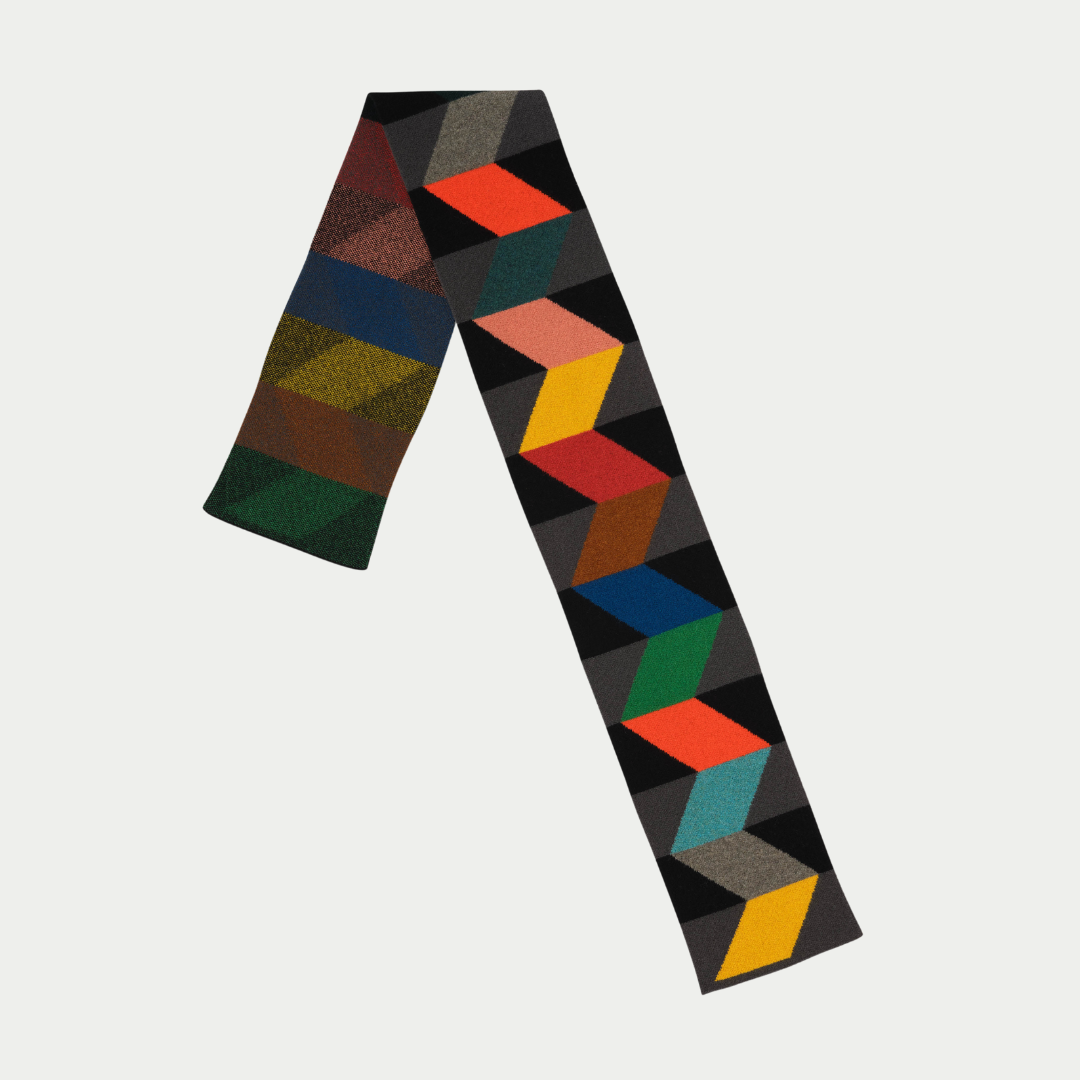 Multicolored knit scarf with geometric pattern.