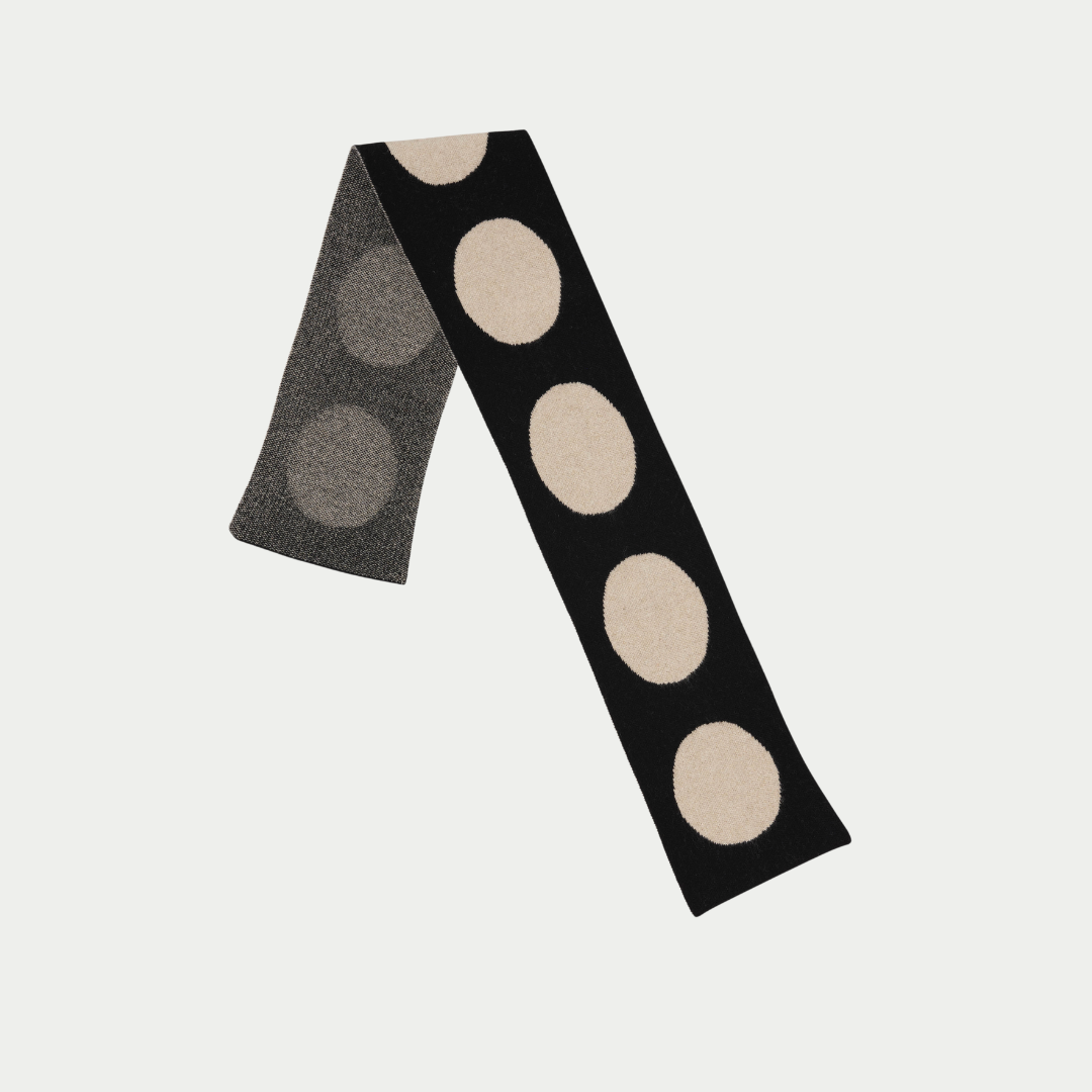 Black and beige polka dot knit scarf.