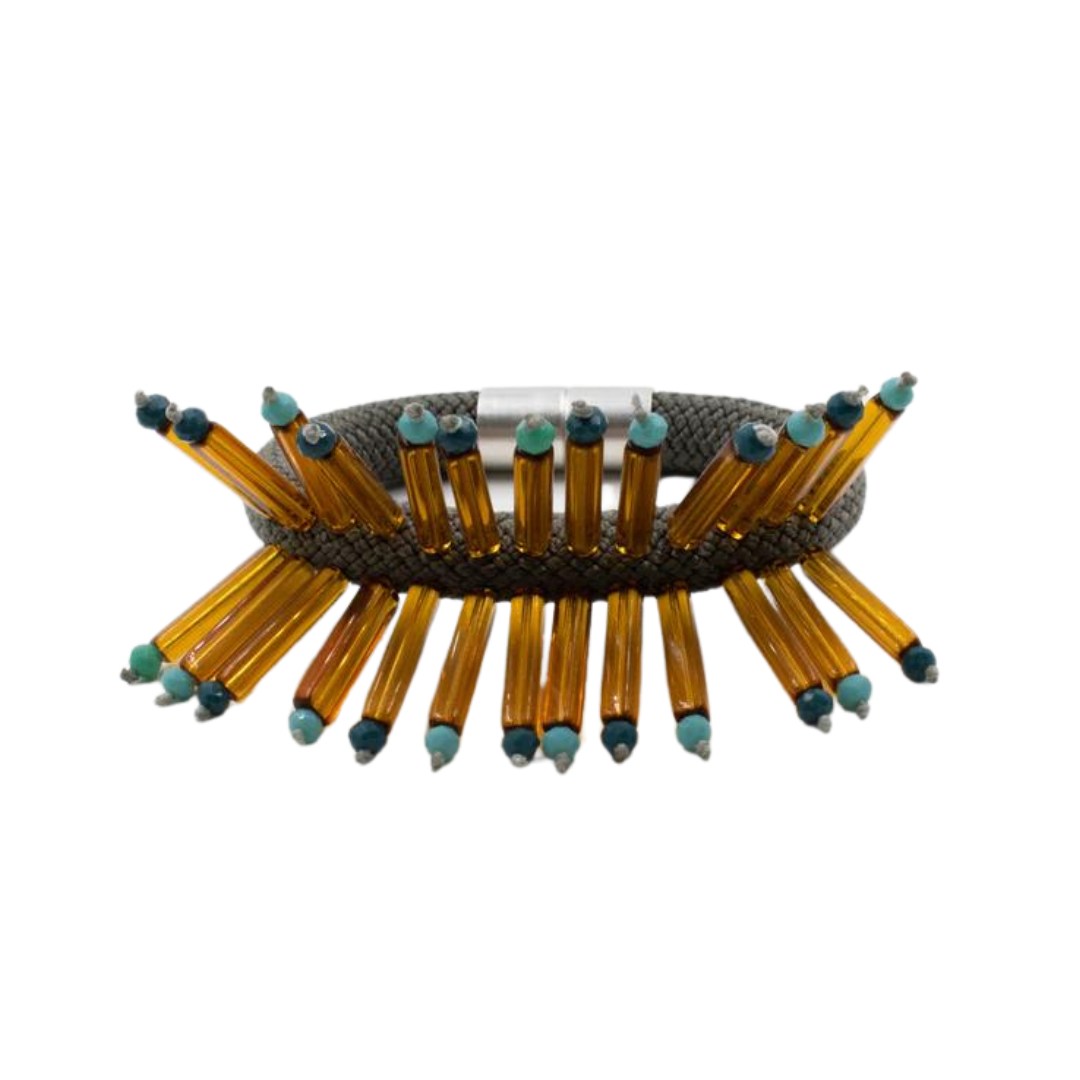 Amber and turquoise beaded bracelet with a gray cord base.  The beads are arranged in a radiating pattern.