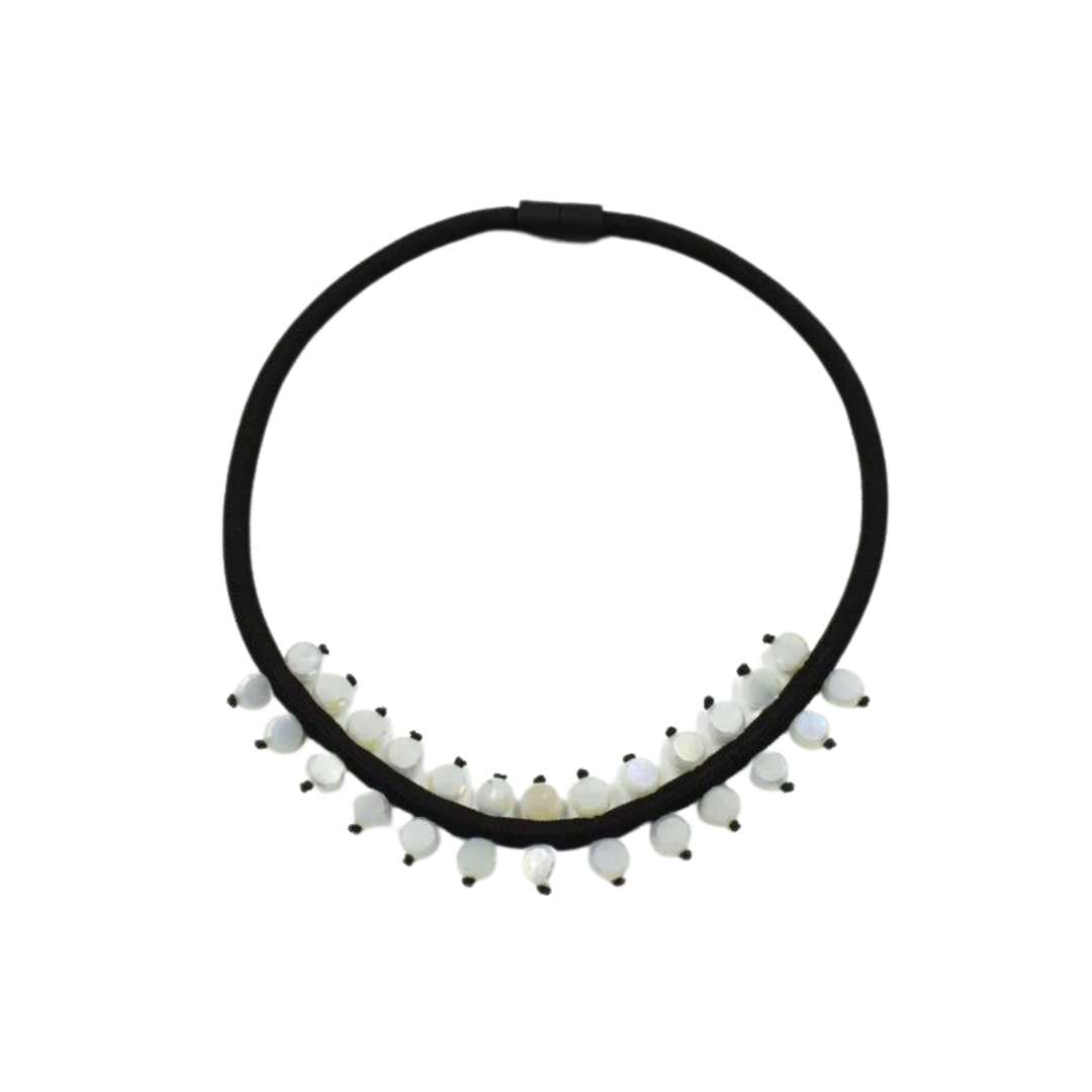 Black elastic necklace with a V-shaped row of off-white, iridescent beads.