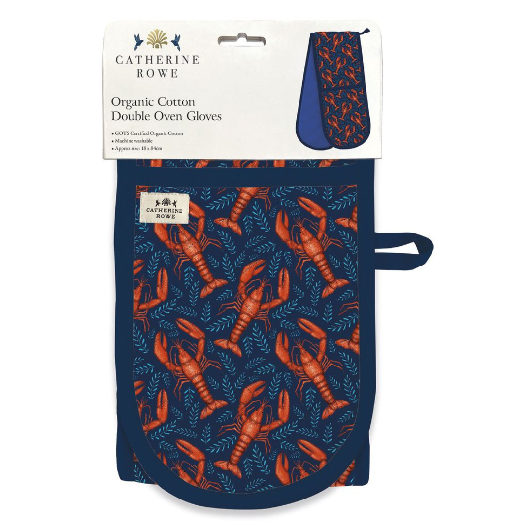 Double oven gloves; navy blue with repeating lobster and leaf pattern; GOTS certified organic cotton.