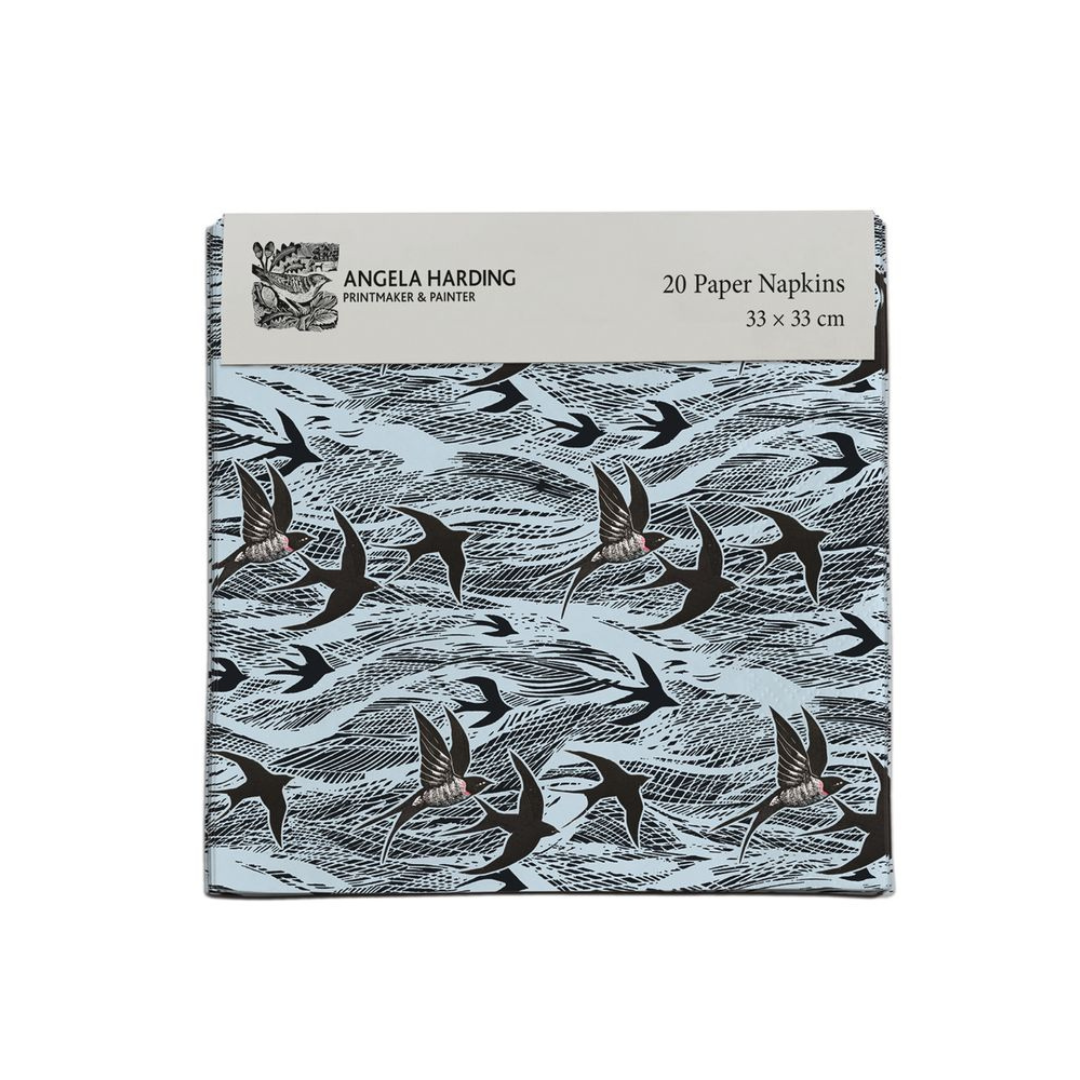 Twenty light-blue paper napkins featuring a repeating pattern of dark birds in flight over stylized waves. 33 x 33 cm.