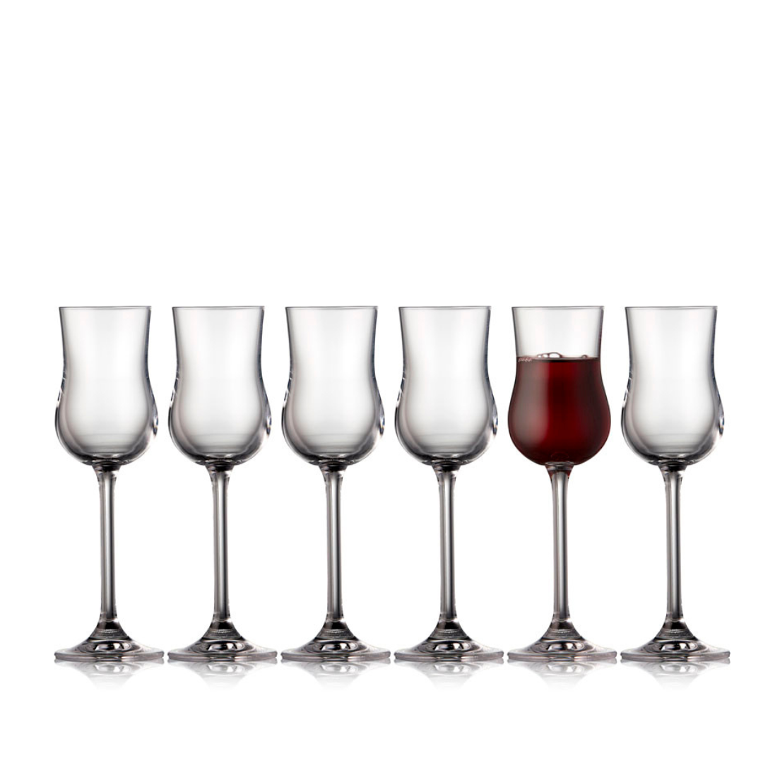 Row of six stemmed glasses; one contains red liquid.