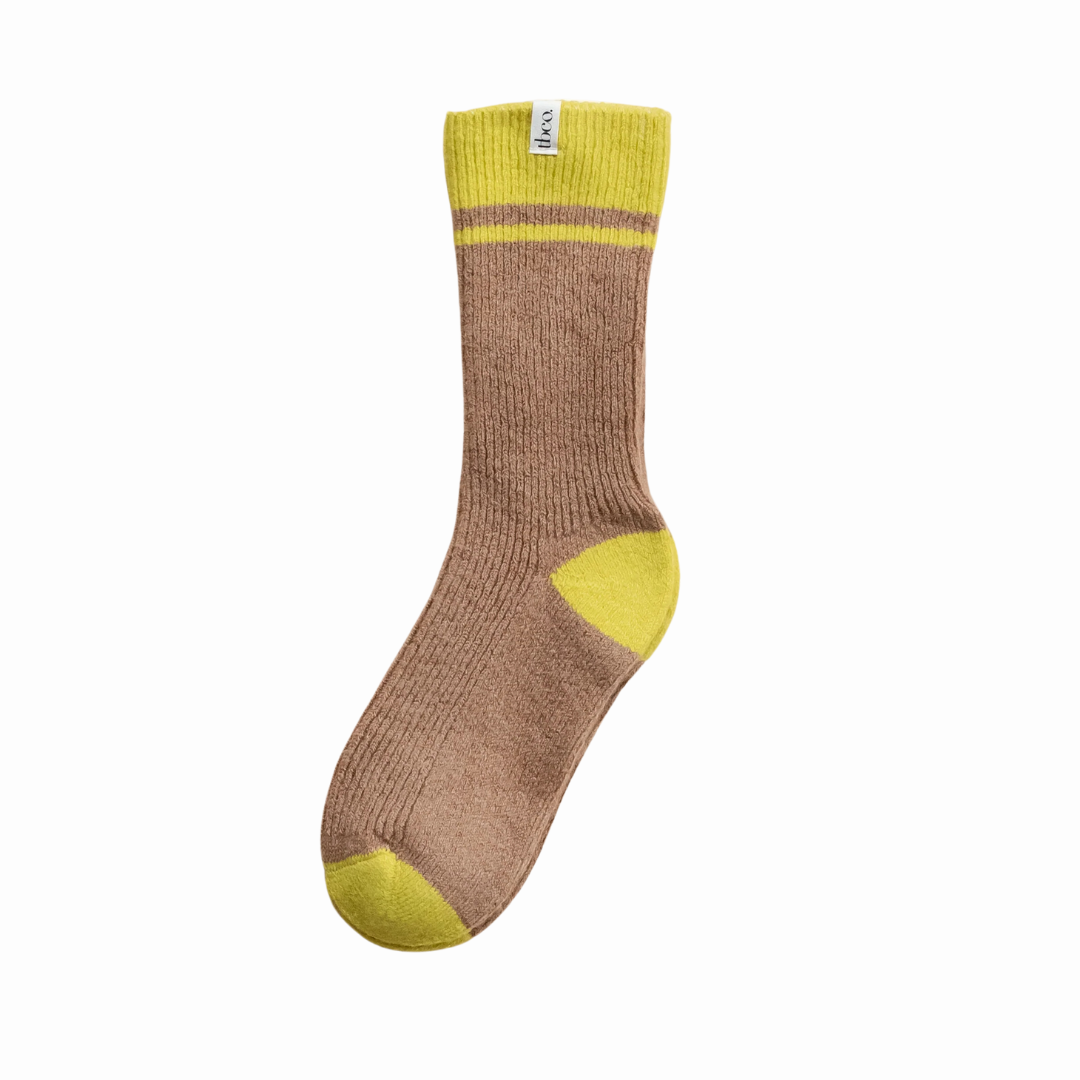 Taupe ribbed sock with yellow cuff and heel.