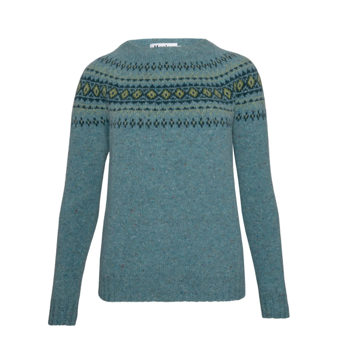Teal crew-neck wool sweater with a Fair Isle-style patterned yoke in dark teal, olive, and yellow.