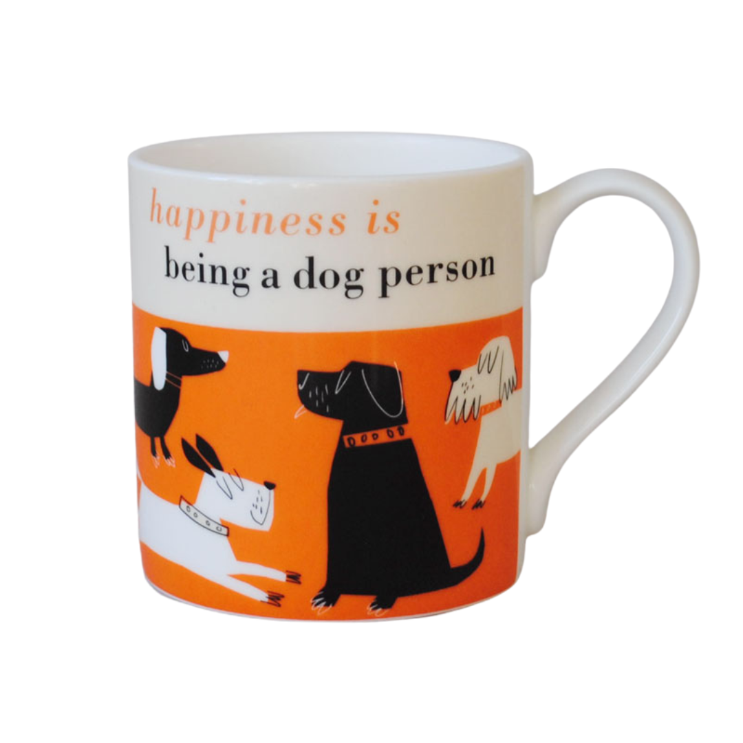 White mug featuring an orange band with illustrated dogs and the text "Happiness is being a dog person".