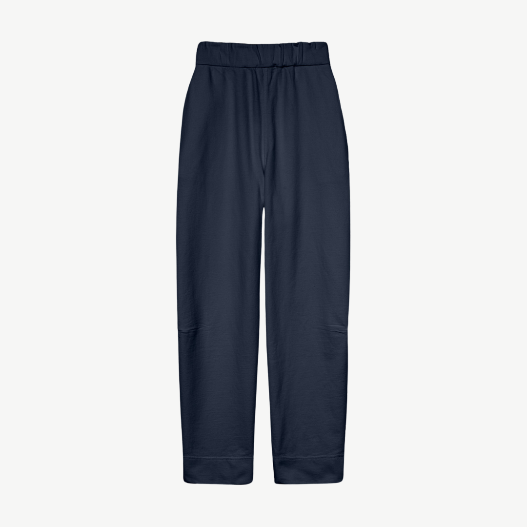 Navy blue casual pants with an elastic waistband and cuffed hems.