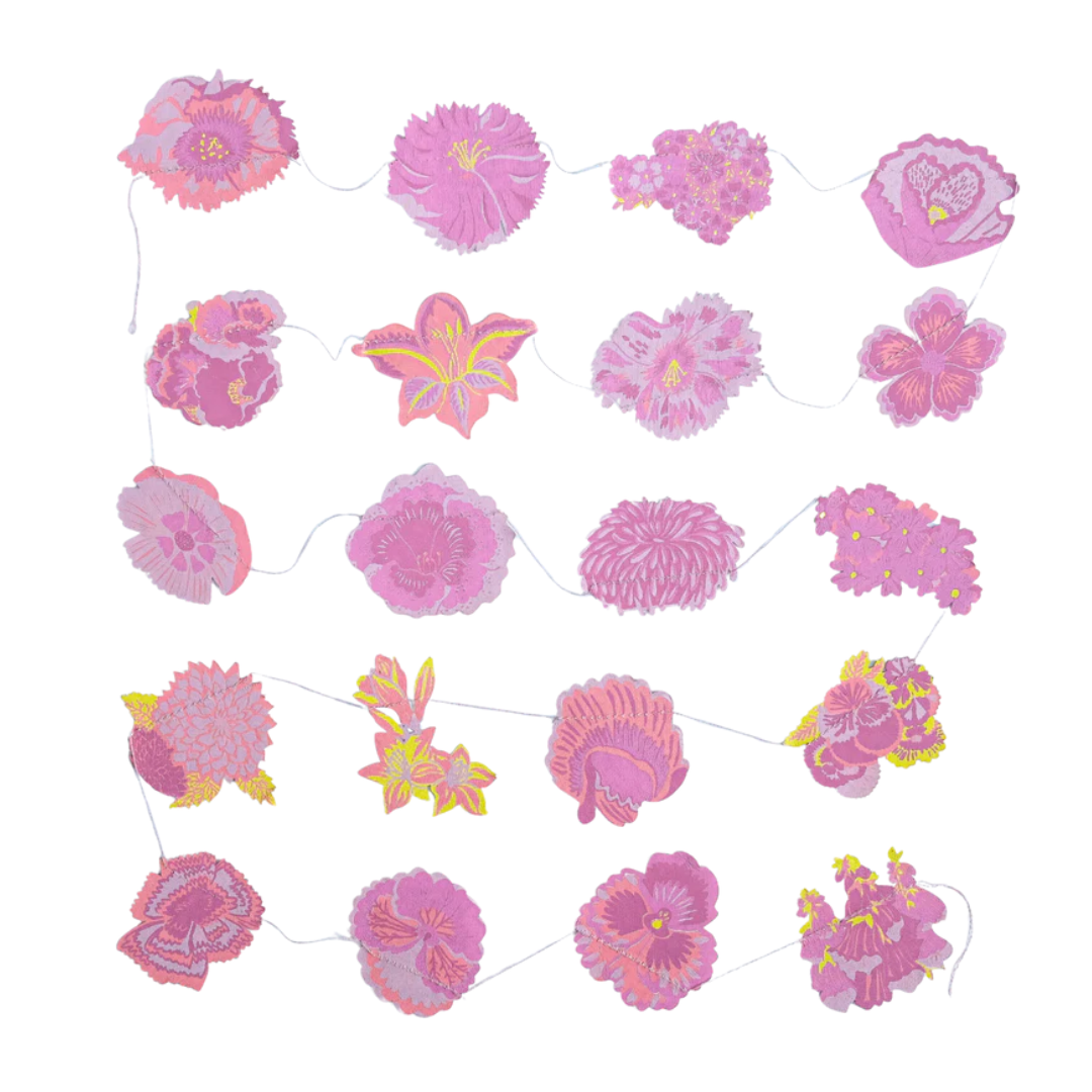 Pink and yellow floral garland with various flower types.